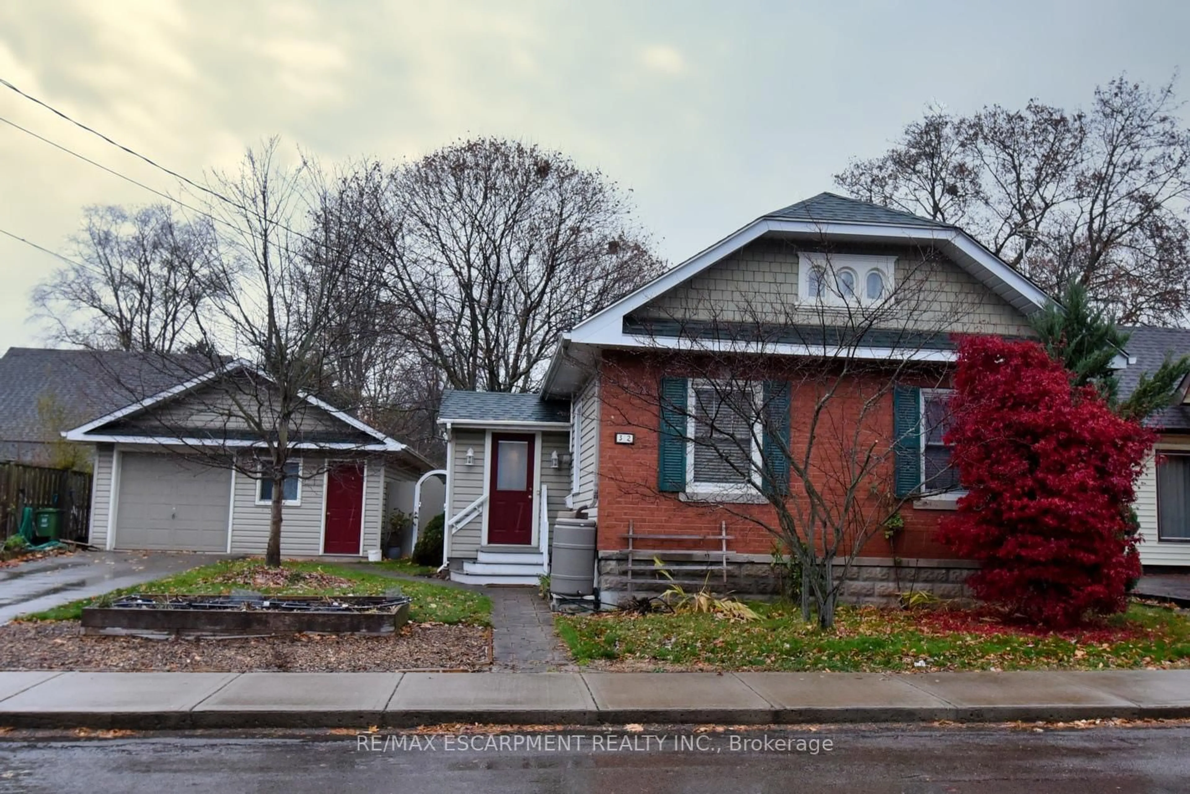 Home with brick exterior material, street for 32 Matilda St, Hamilton Ontario L9H 3C5