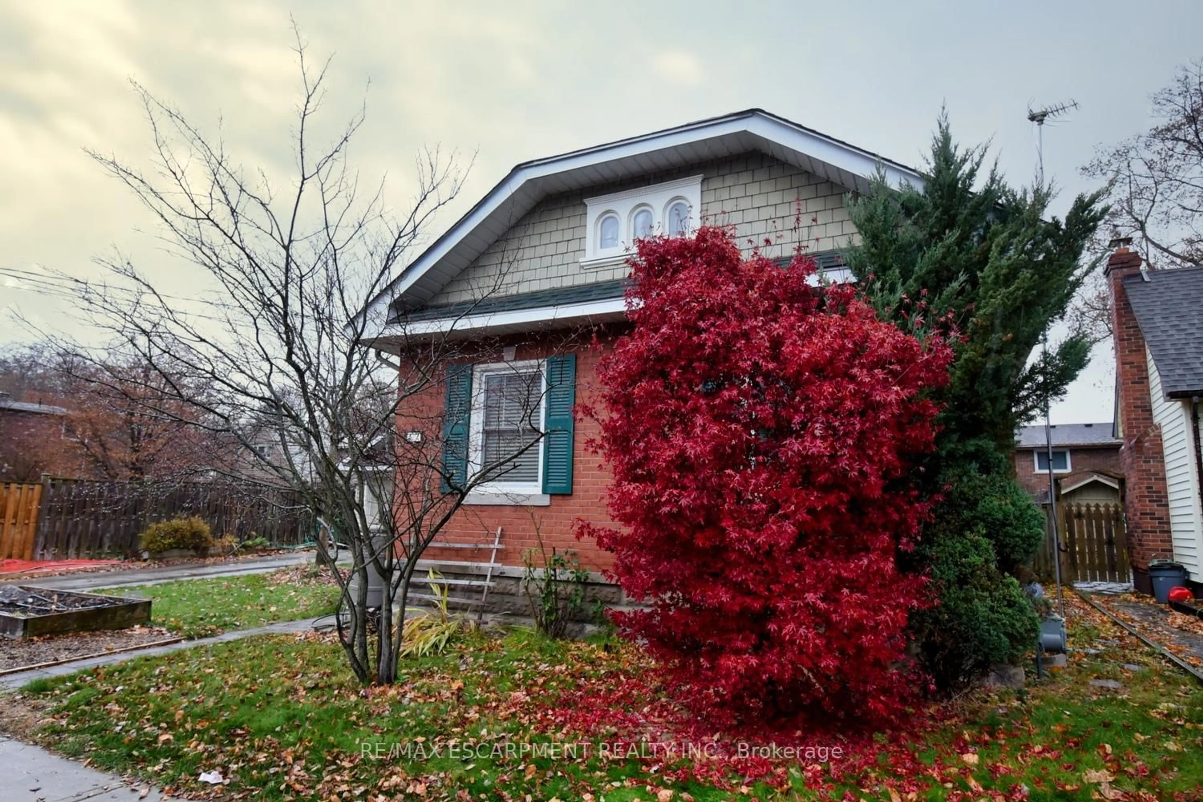 Home with brick exterior material, street for 32 Matilda St, Hamilton Ontario L9H 3C5