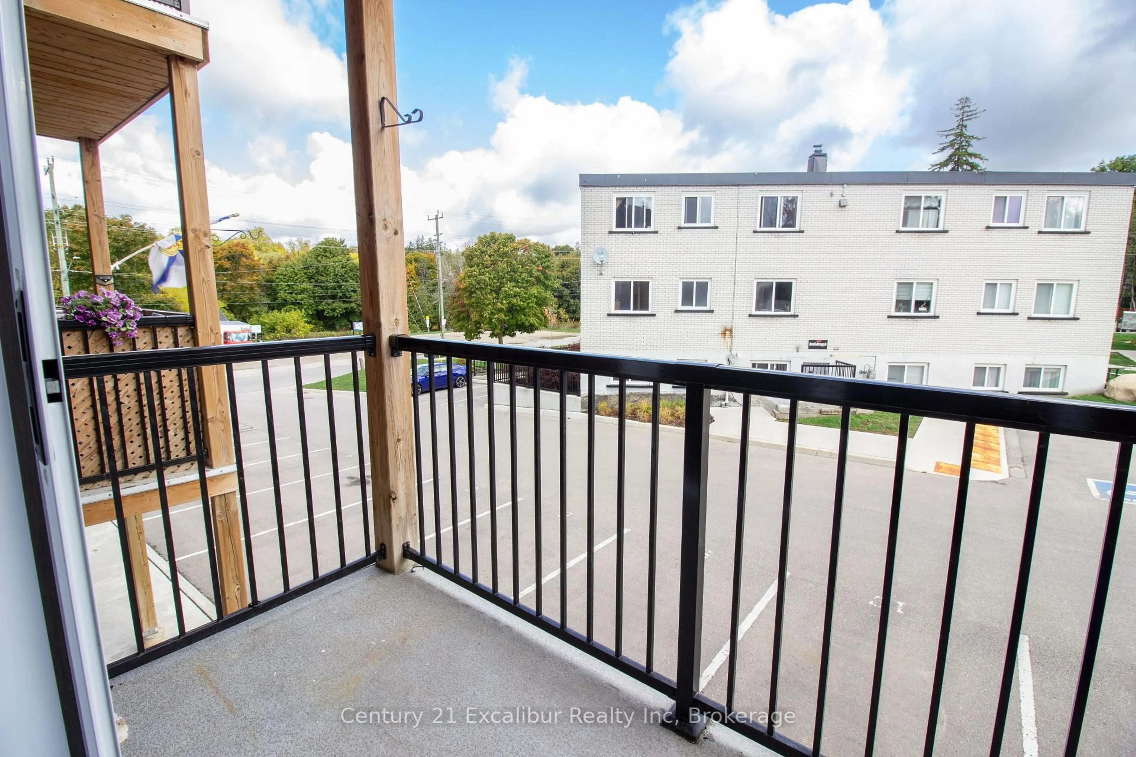 Balcony in the apartment, city buildings view from balcony for 320 Queen St #9, Centre Wellington Ontario N1M 1T4