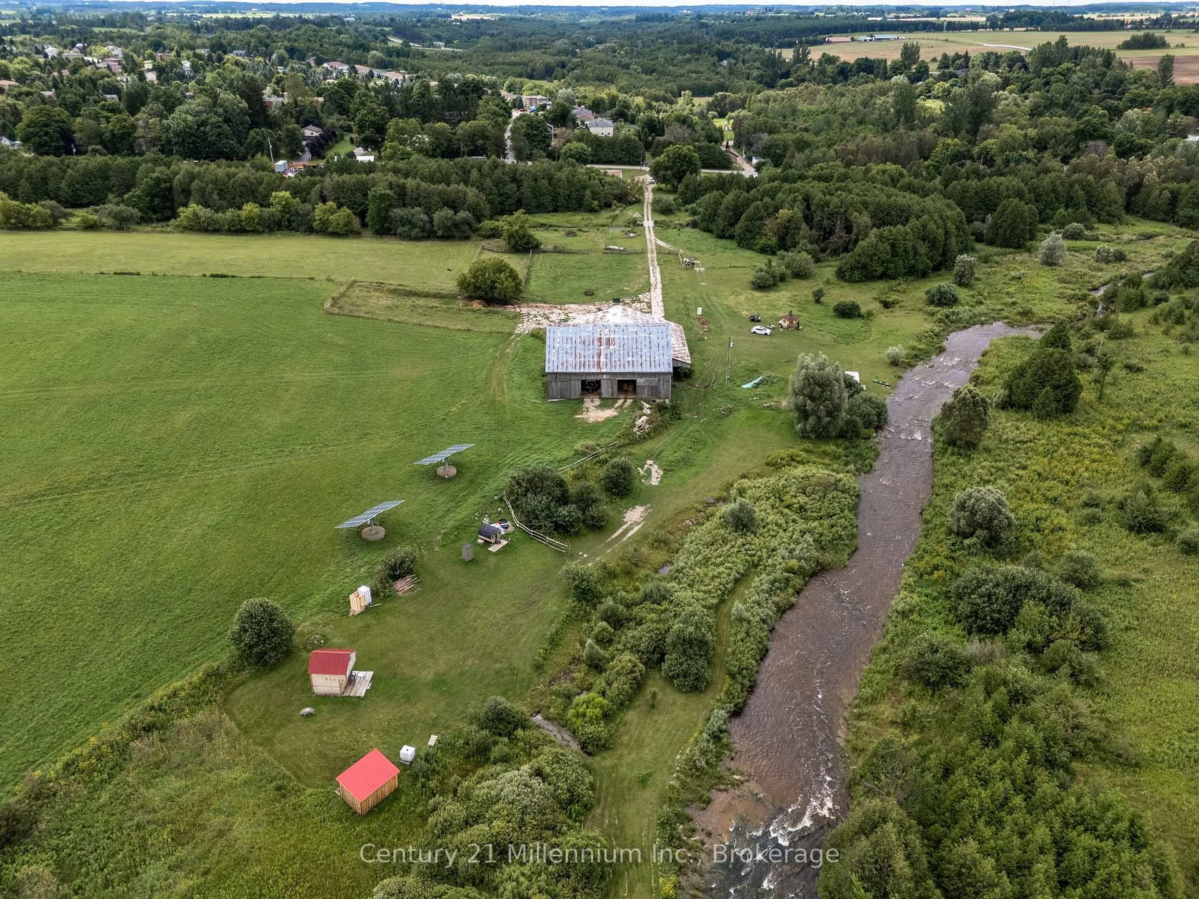 A pic from outside/outdoor area/front of a property/back of a property/a pic from drone, unknown for 21 STATION St, Amaranth Ontario L9W 0V2