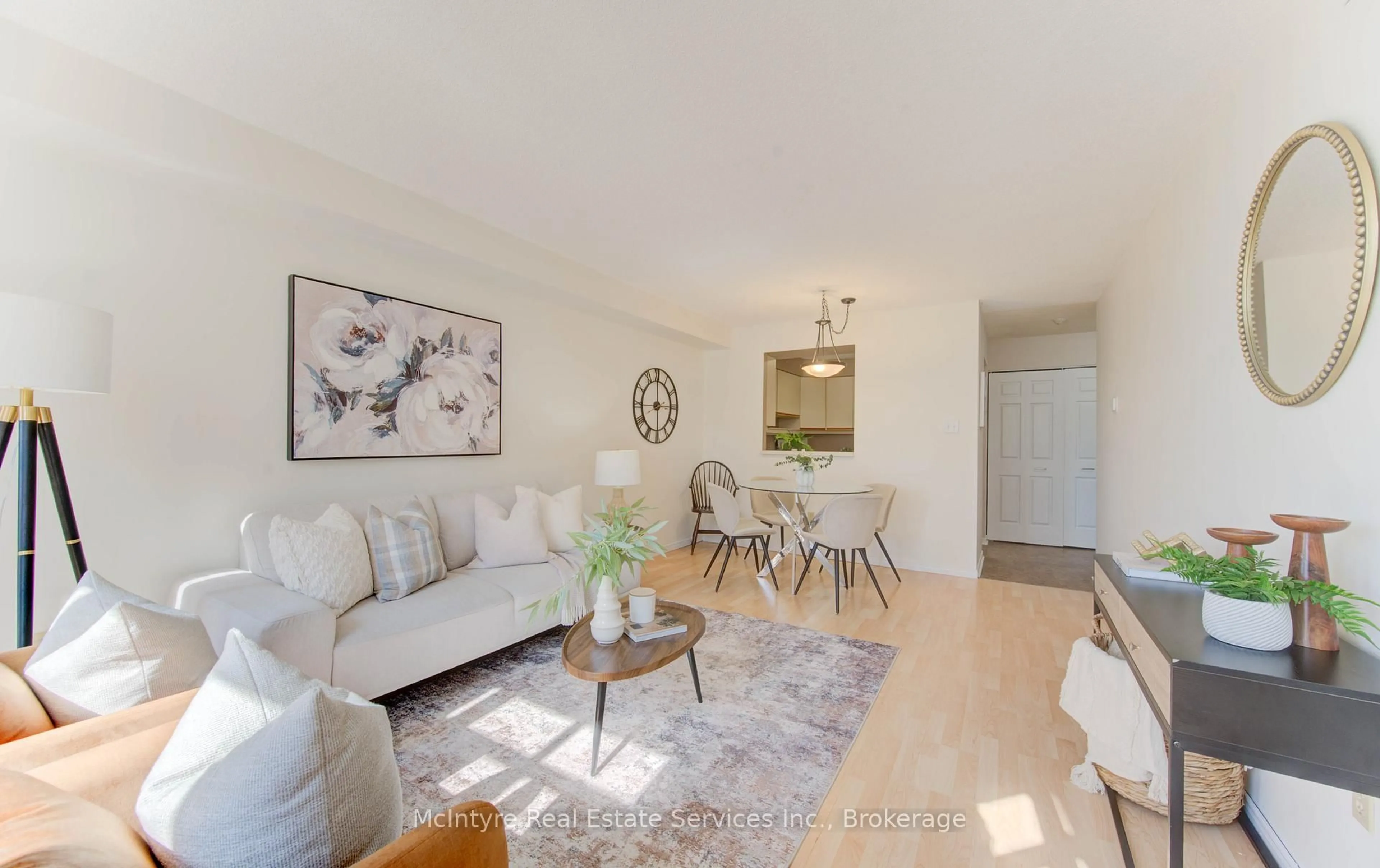 Living room with furniture, wood/laminate floor for 1414 King St #405, Kitchener Ontario N2G 4T8