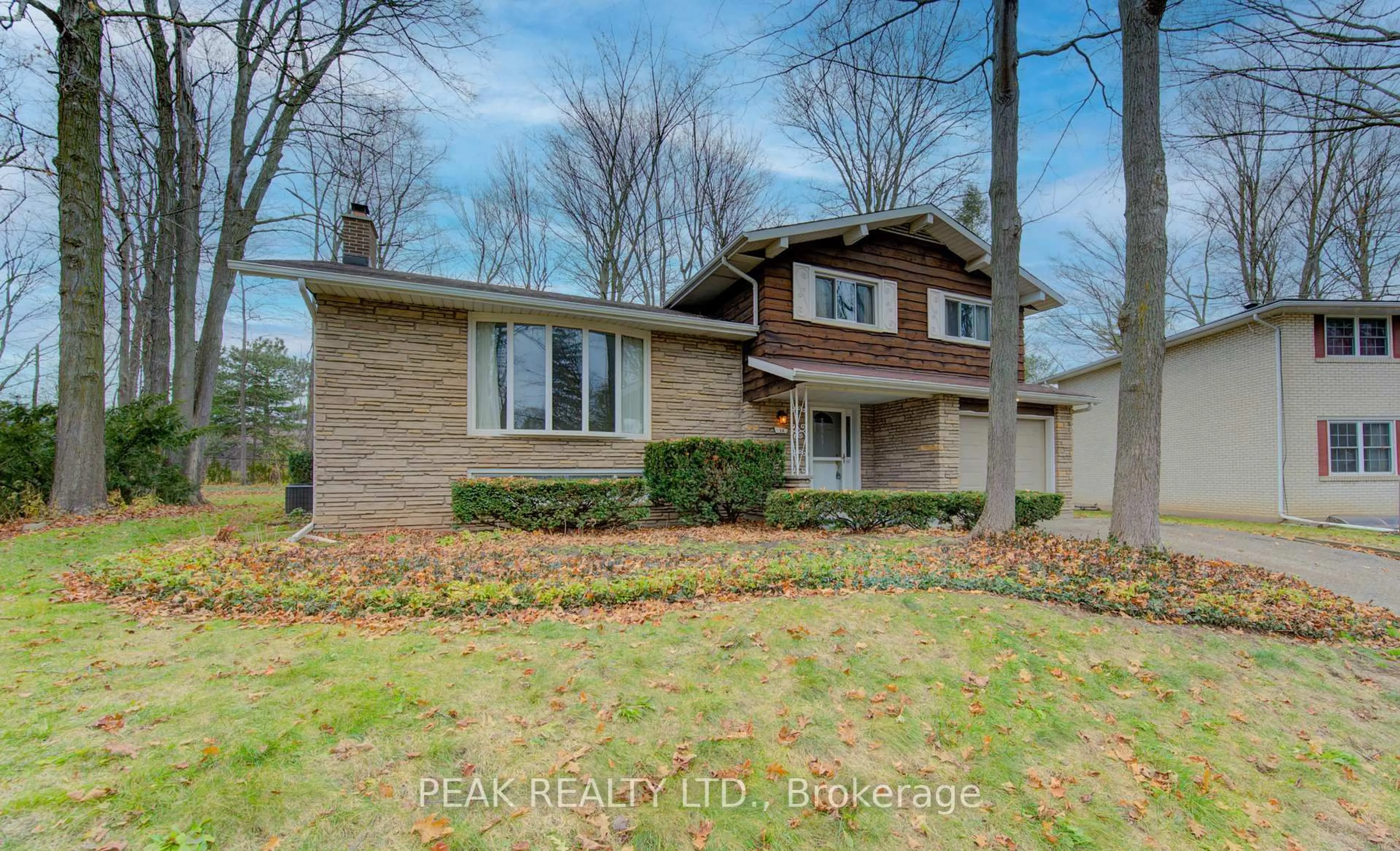 Home with brick exterior material, street for 38 Glenwood Dr, Kitchener Ontario N2A 1H7