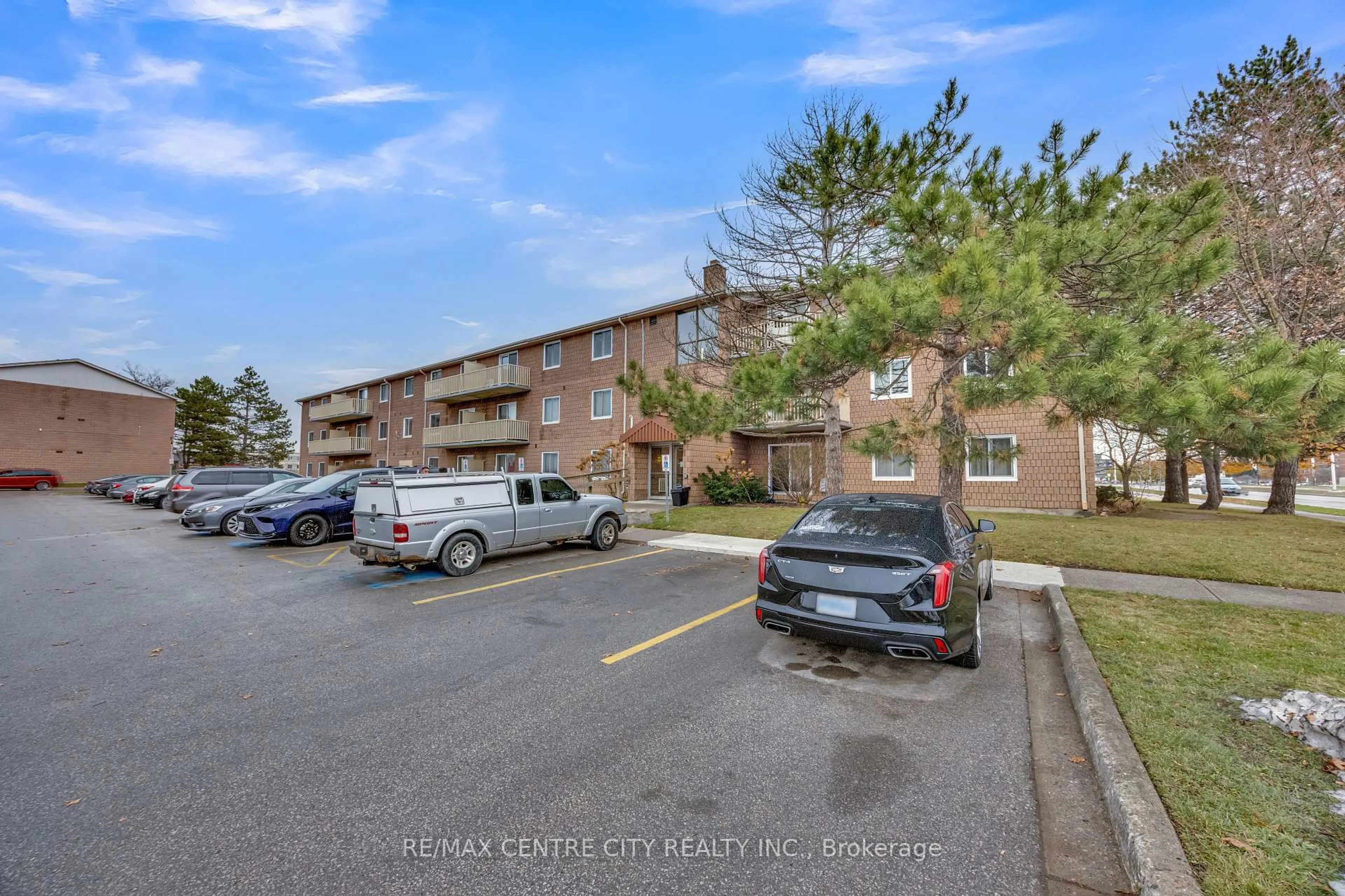 A pic from outside/outdoor area/front of a property/back of a property/a pic from drone, street for 1584 Ernest Ave #301, London South Ontario N6E 1X9
