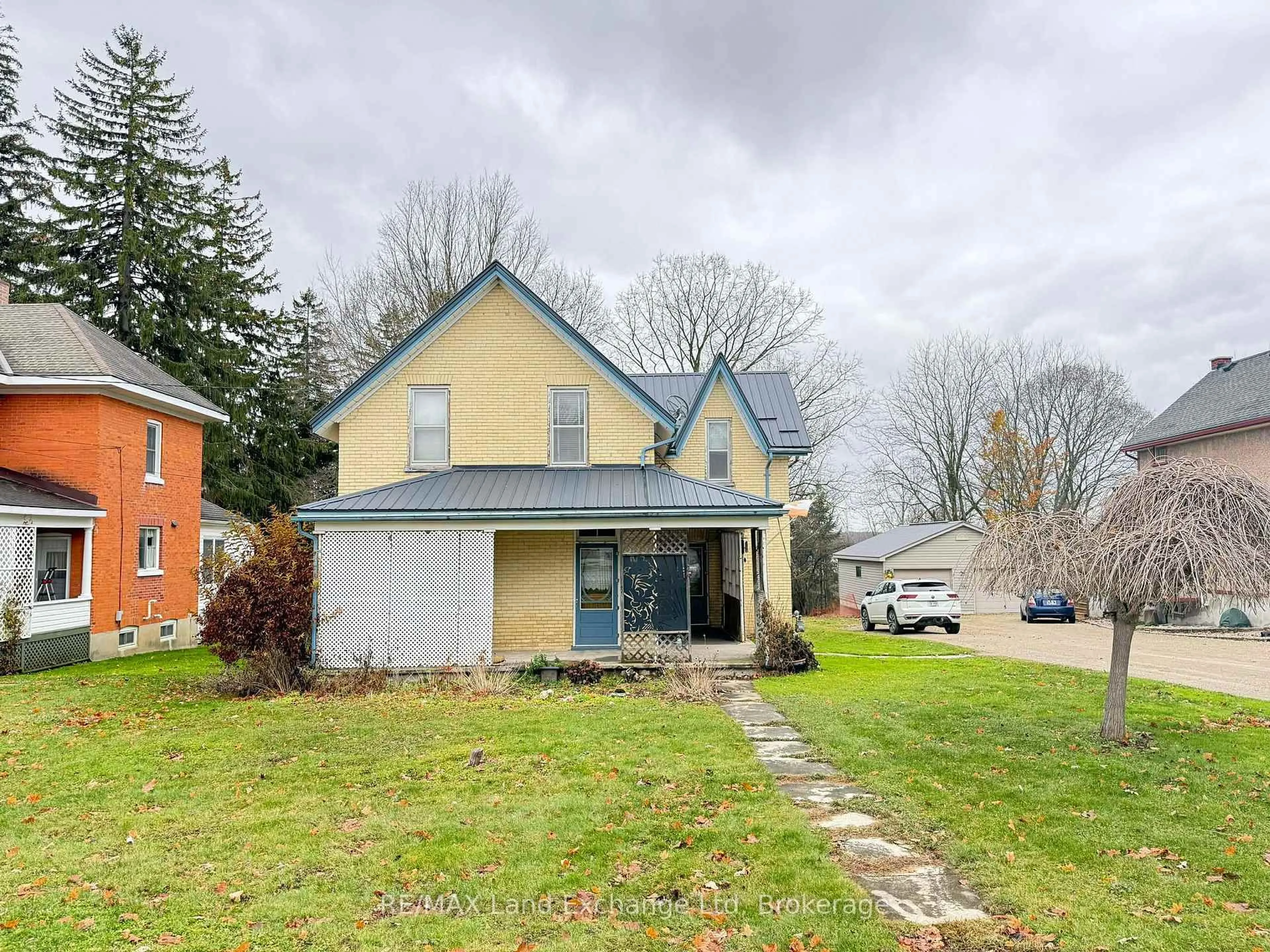 A pic from outside/outdoor area/front of a property/back of a property/a pic from drone, street for 126 Diagonal Rd, North Huron Ontario N0G 2W0