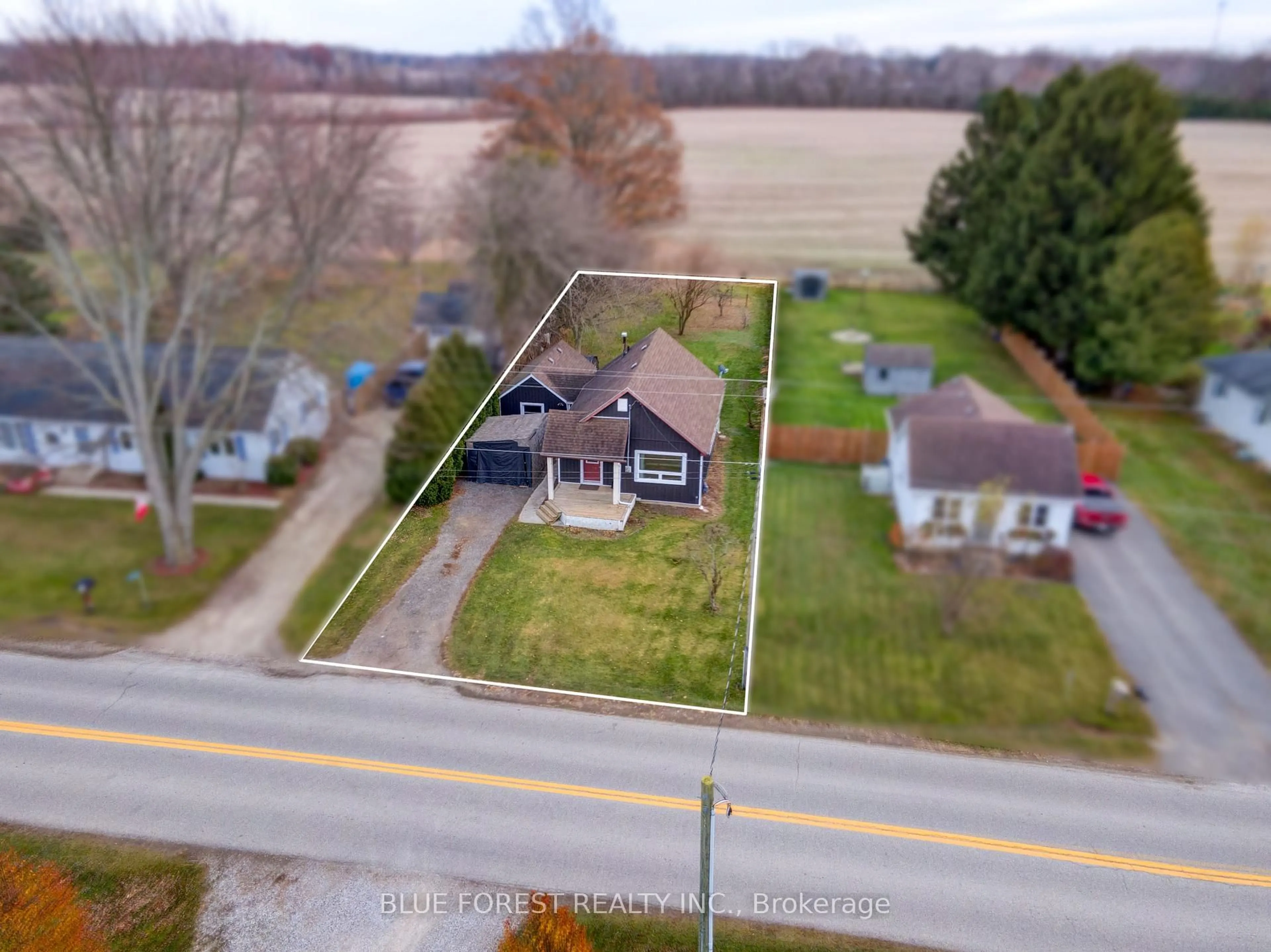 A pic from outside/outdoor area/front of a property/back of a property/a pic from drone, street for 22557 Queens Line, West Elgin Ontario N0L 2C0