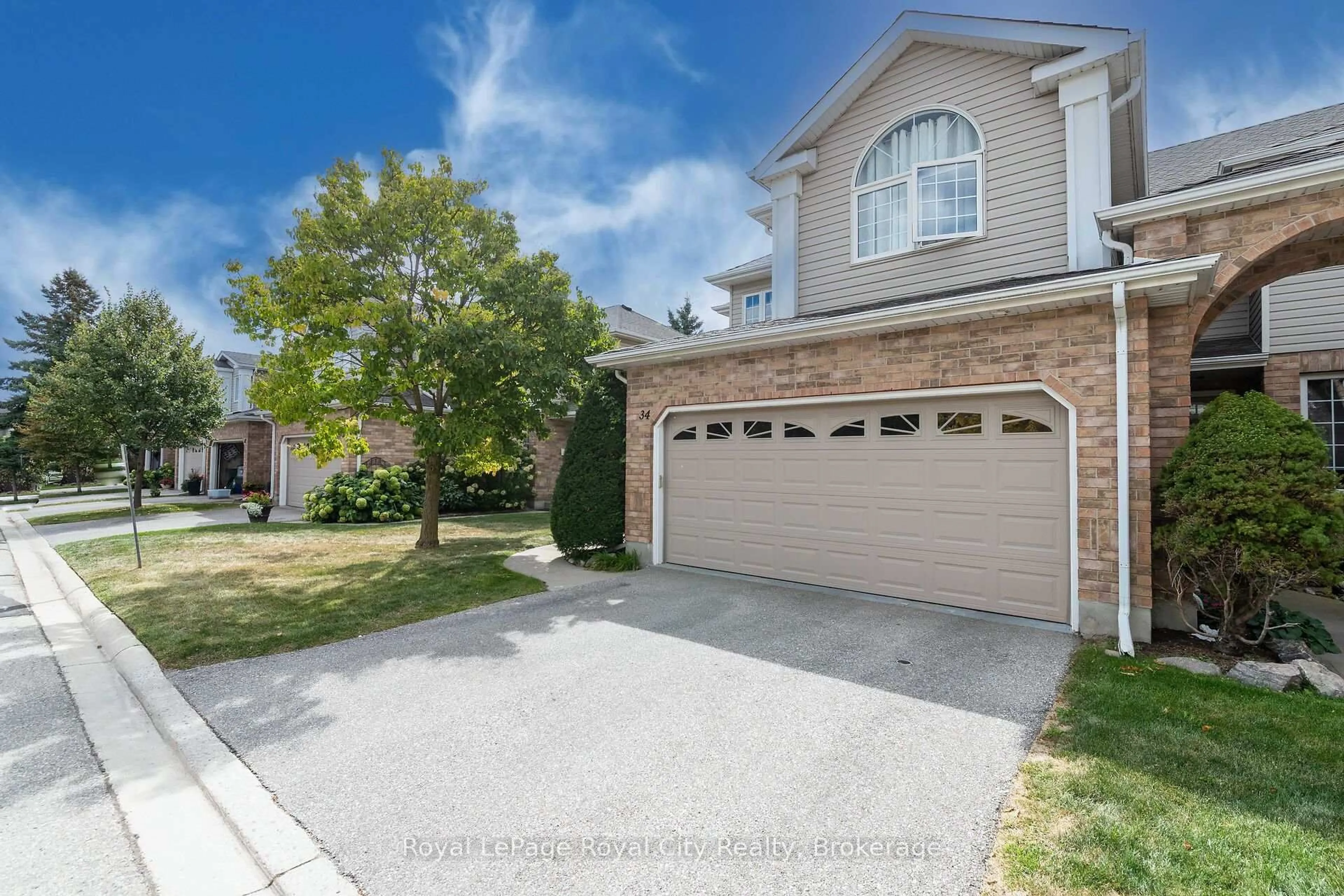 A pic from outside/outdoor area/front of a property/back of a property/a pic from drone, street for 1550 Gordon St #34, Guelph Ontario N1L 1C7