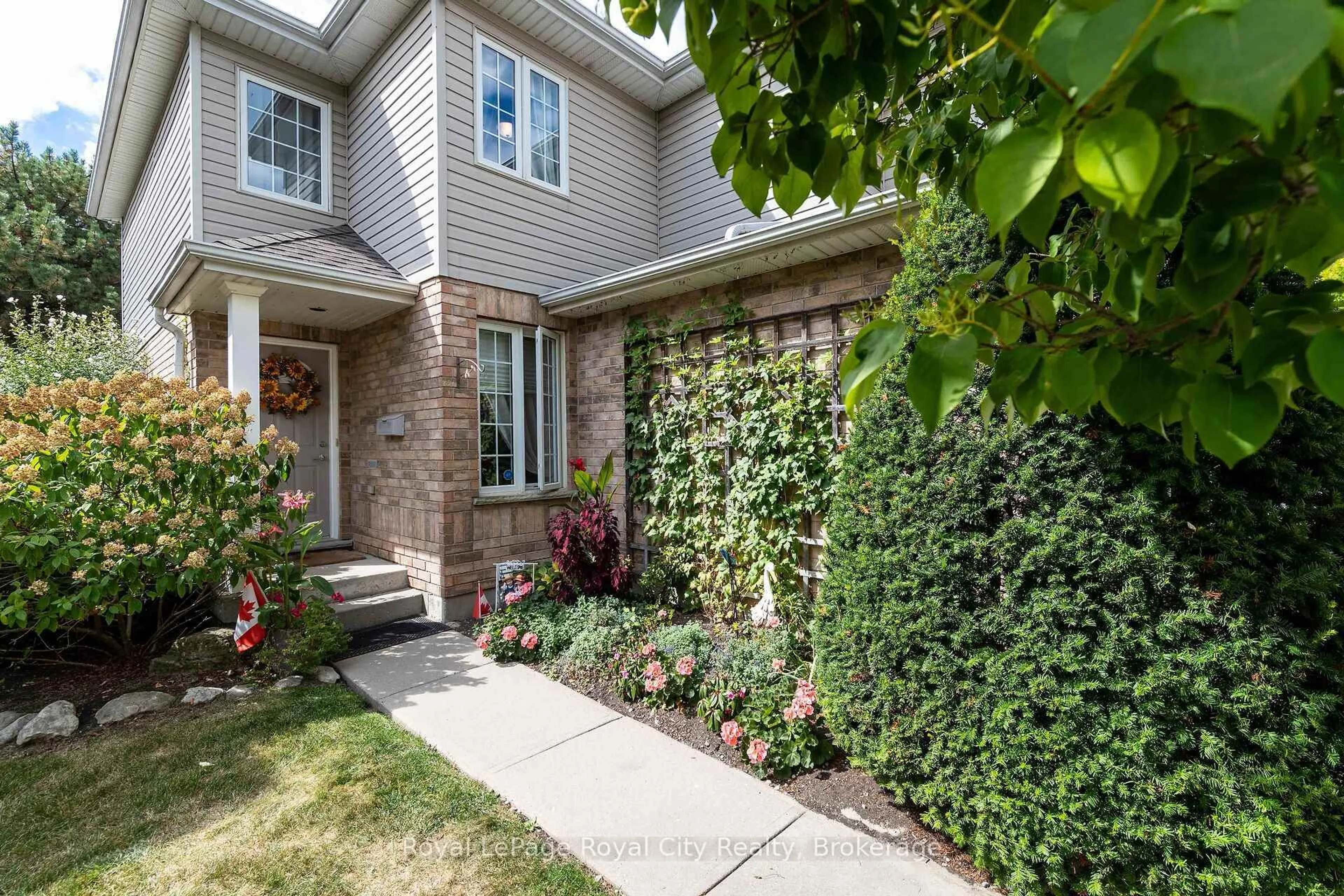 Home with brick exterior material, street for 1550 Gordon St #34, Guelph Ontario N1L 1C7