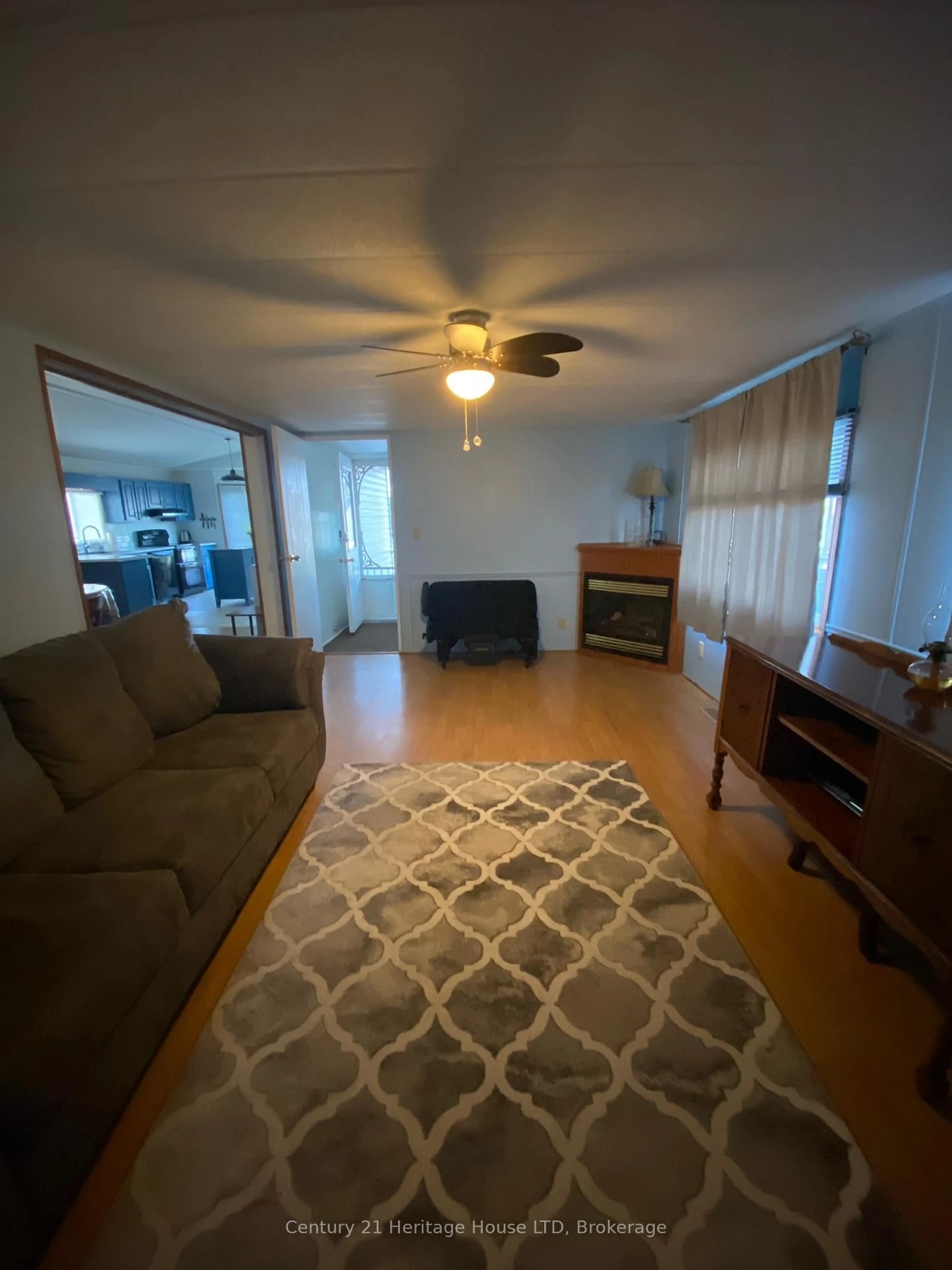 Living room with furniture, unknown for 3033 Townline Rd #187, Fort Erie Ontario L0S 1S1