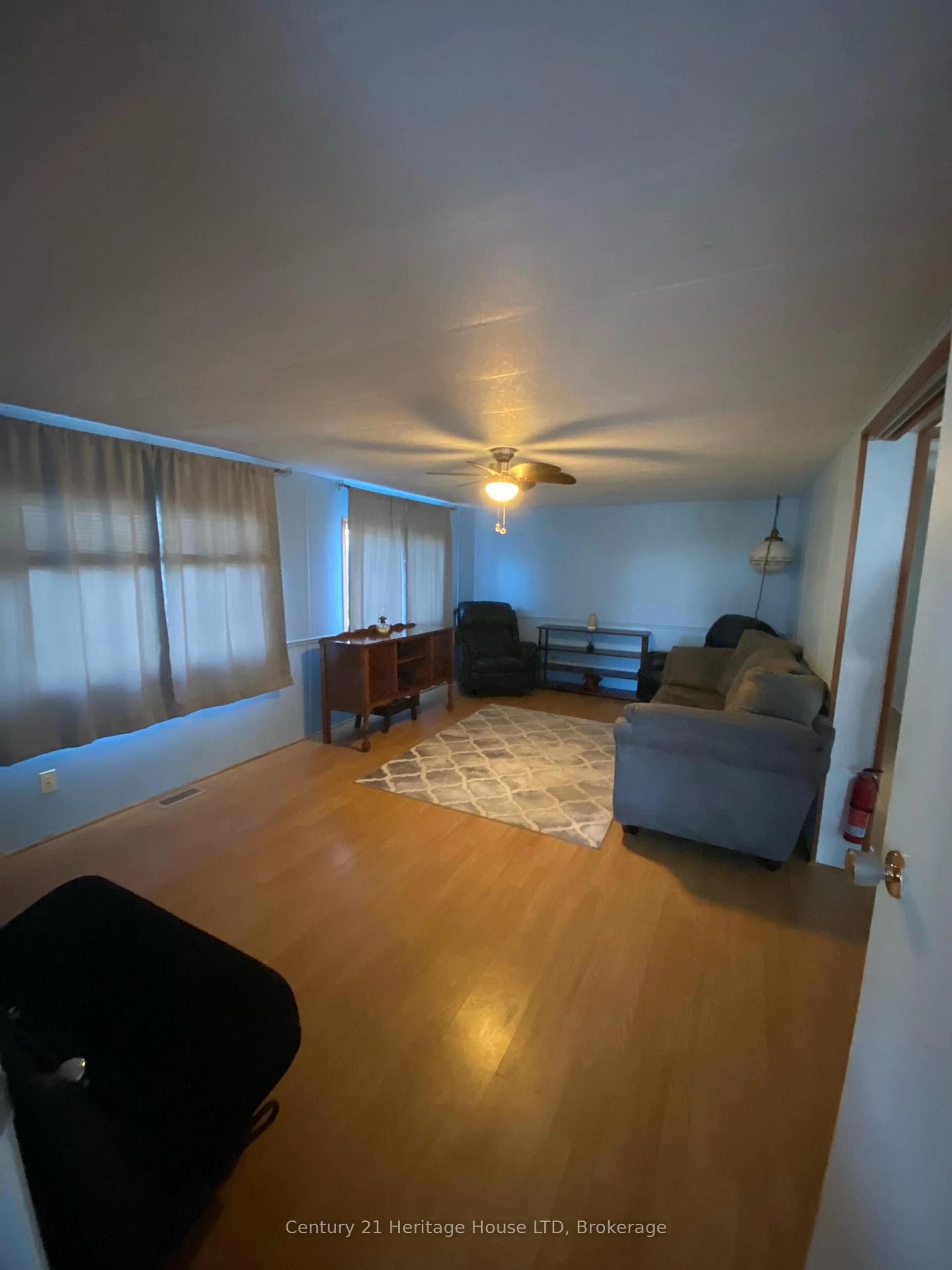 Living room with furniture, unknown for 3033 Townline Rd #187, Fort Erie Ontario L0S 1S1