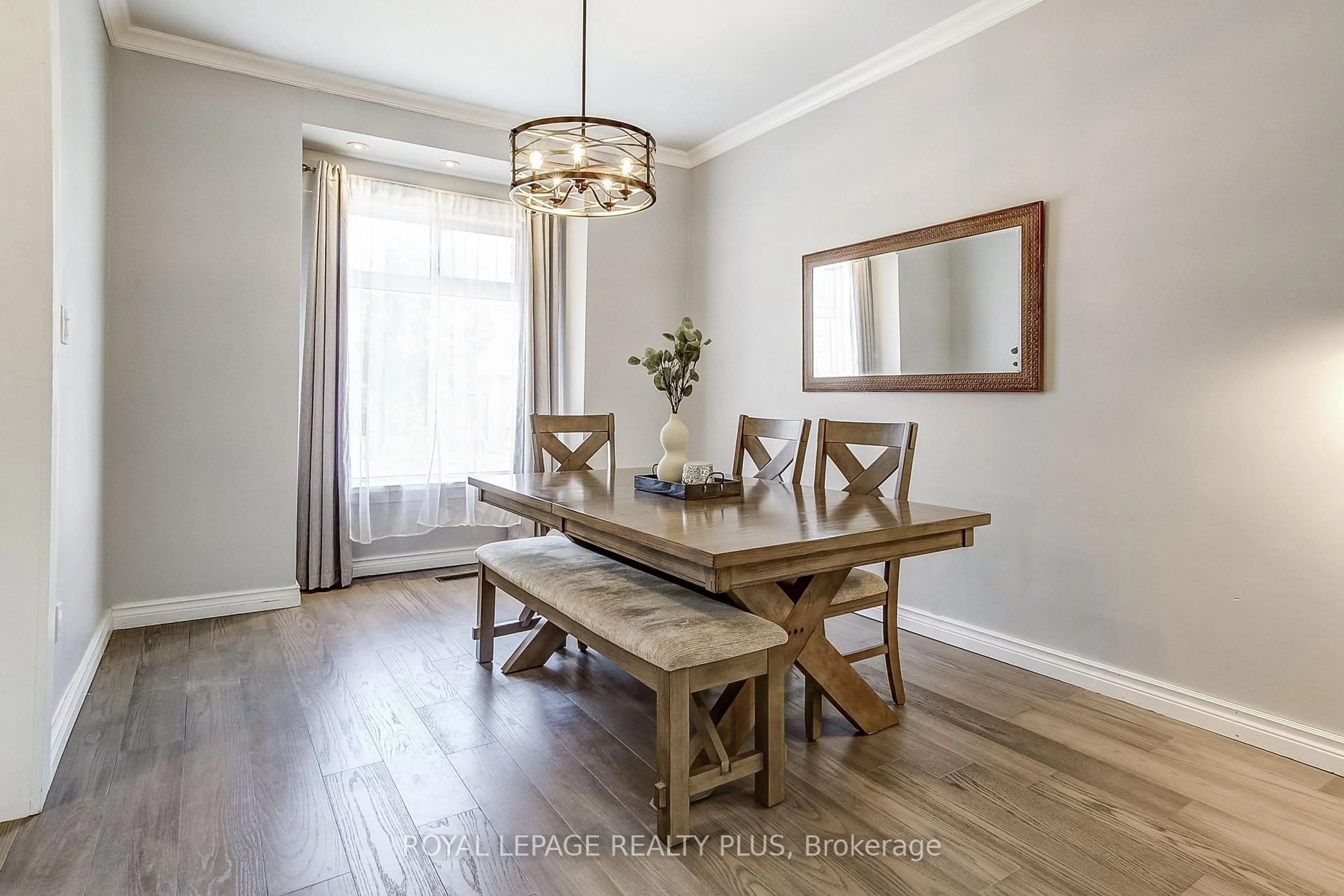Dining room, wood/laminate floor for 38 Rosemont Ave, Hamilton Ontario L8L 2M3