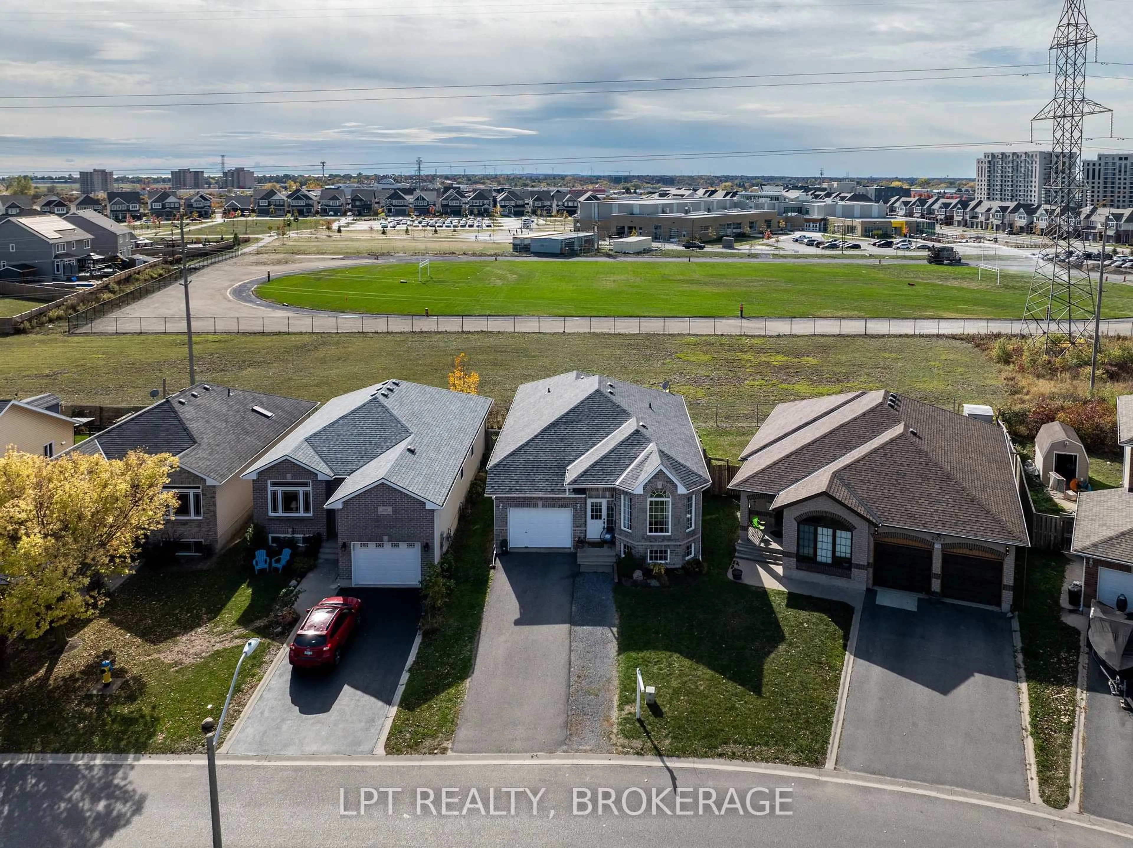 A pic from outside/outdoor area/front of a property/back of a property/a pic from drone, water/lake/river/ocean view for 2073 Swanfield St, Kingston Ontario K7M 0A9