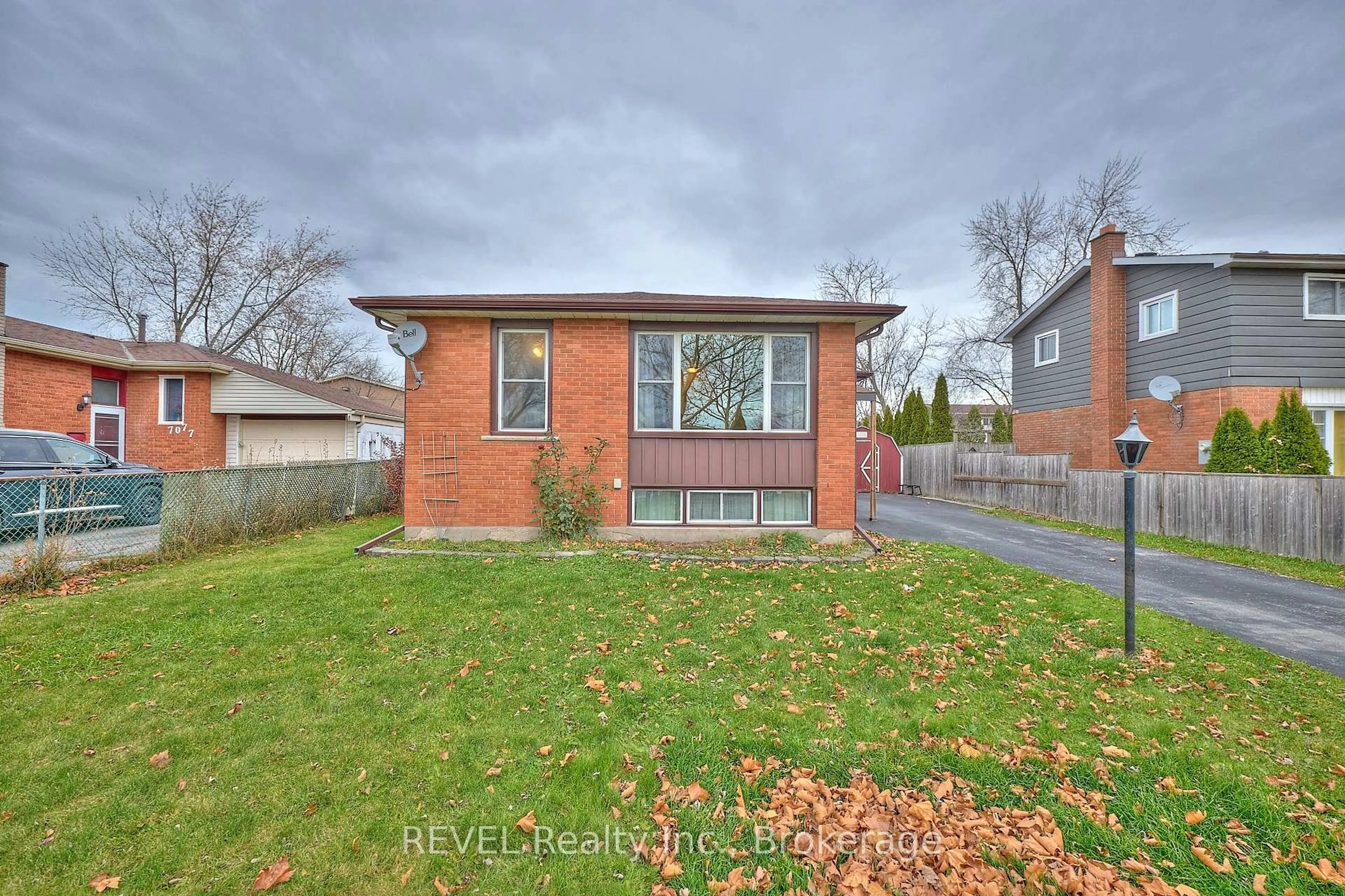 Home with brick exterior material, street for 7067 Centennial St, Niagara Falls Ontario L2G 2Z2