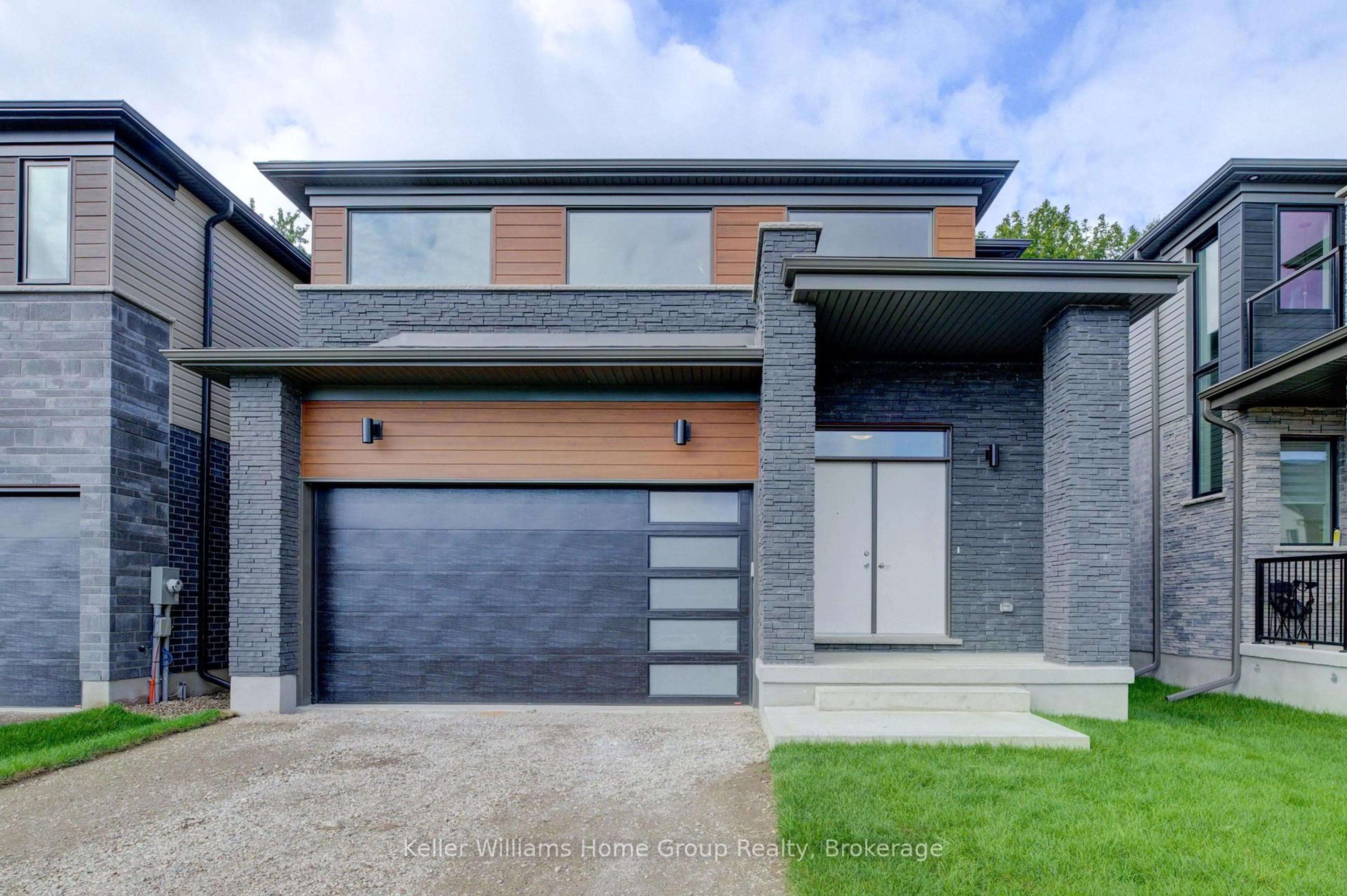 Home with brick exterior material, street for 16 Nicholas Way, Guelph Ontario N1E 0T1