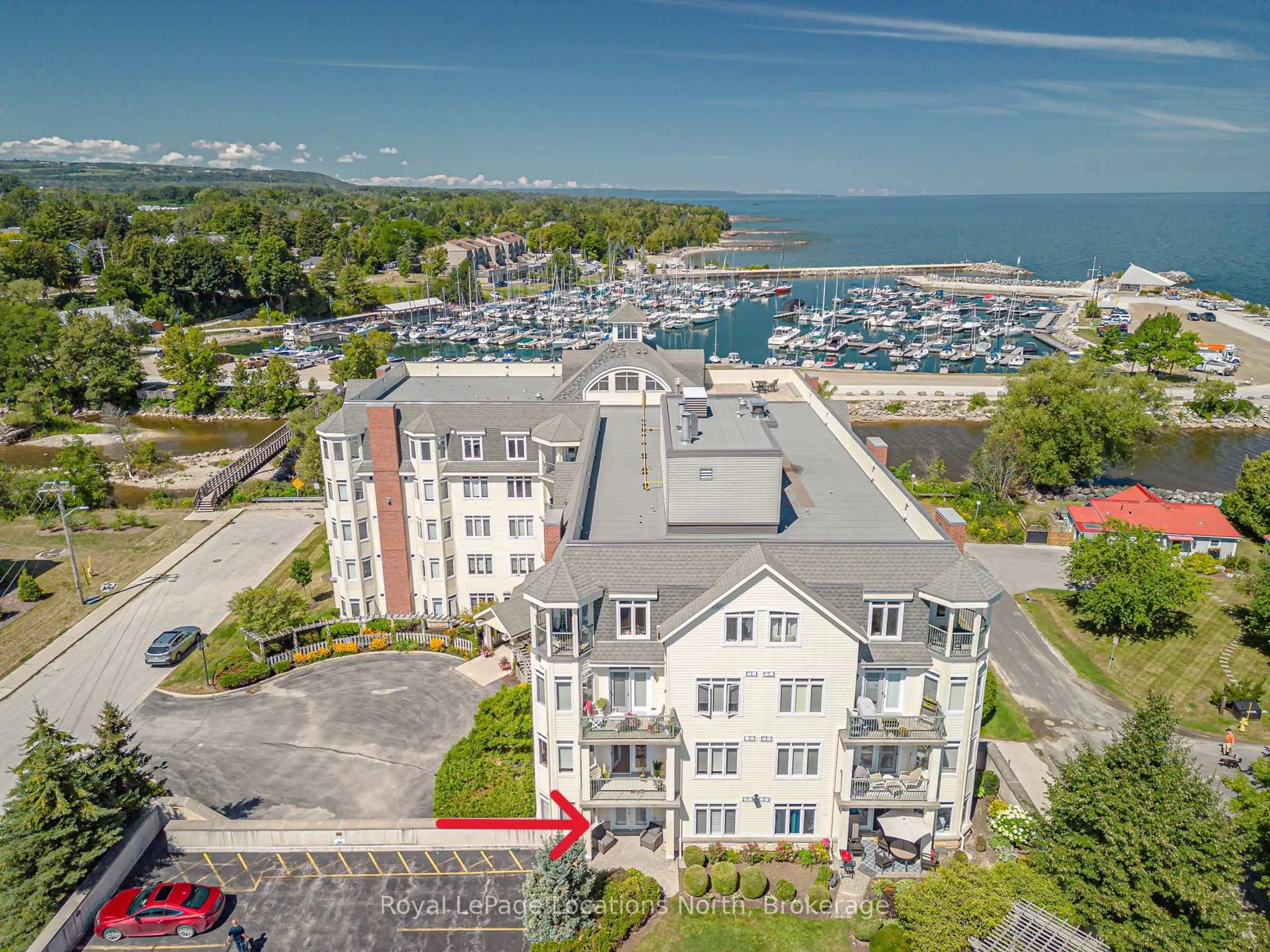 A pic from outside/outdoor area/front of a property/back of a property/a pic from drone, water/lake/river/ocean view for 10 Bay St #207, Blue Mountains Ontario N0H 2P0