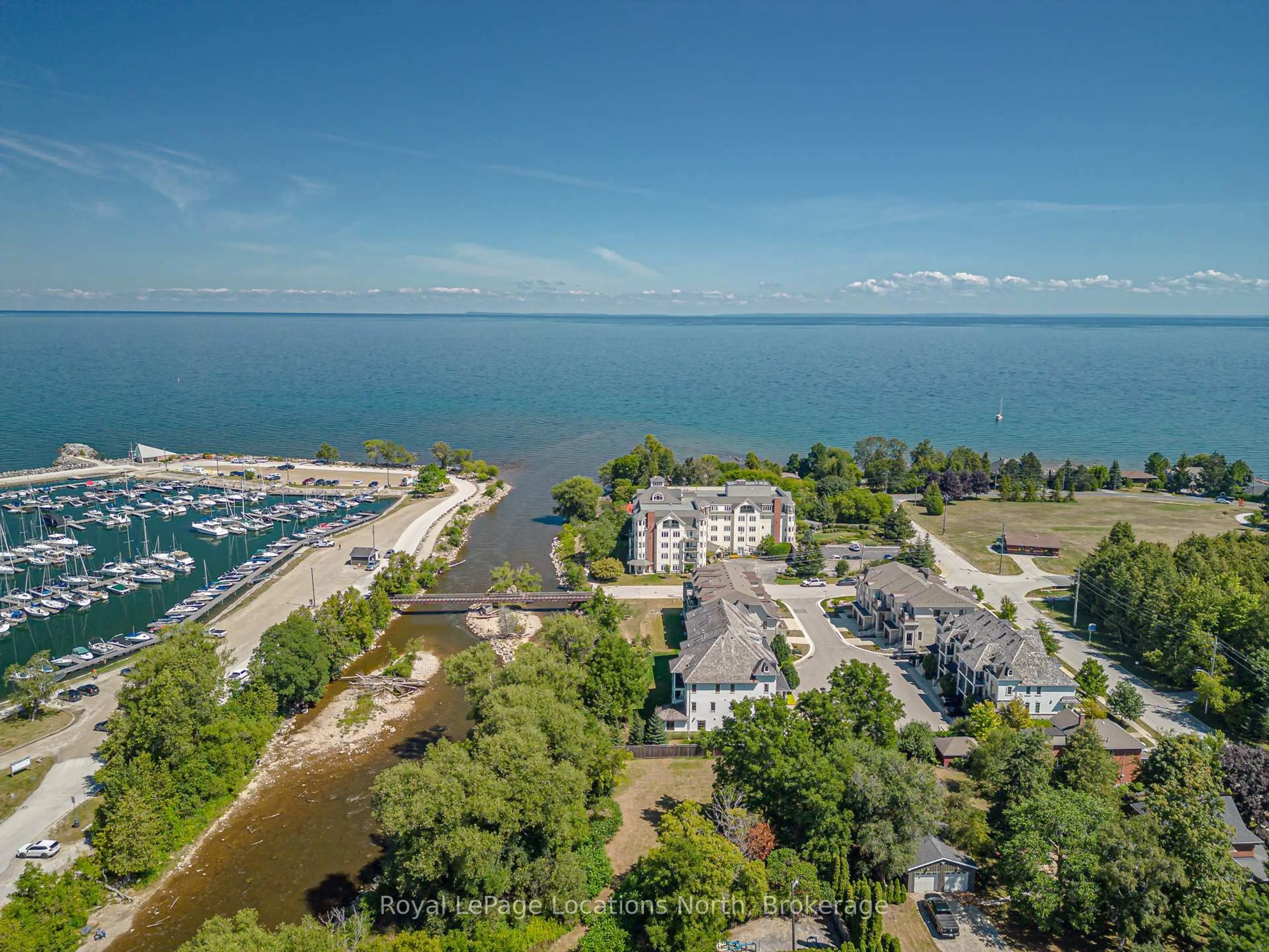 A pic from outside/outdoor area/front of a property/back of a property/a pic from drone, water/lake/river/ocean view for 10 Bay St #207, Blue Mountains Ontario N0H 2P0
