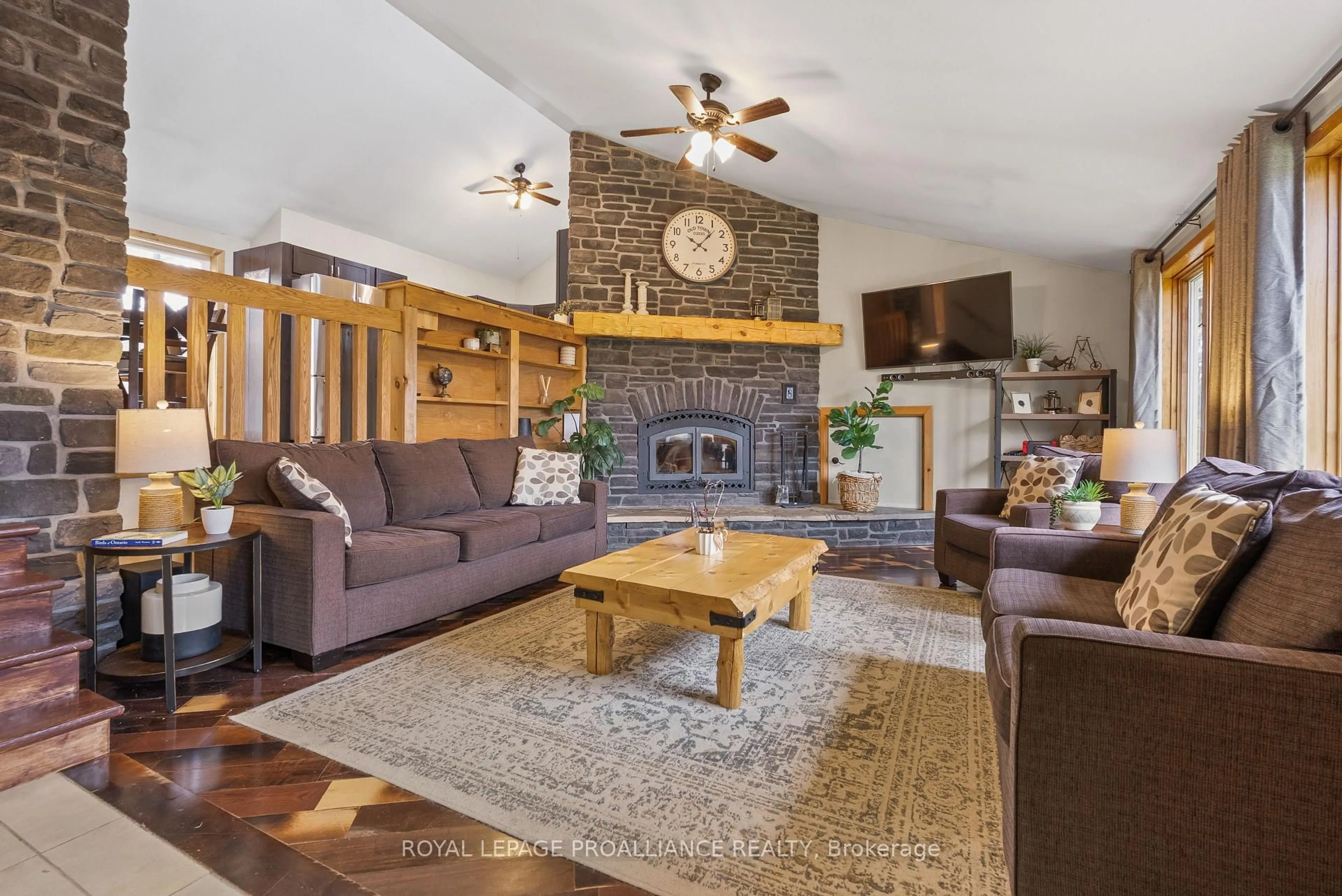 Living room with furniture, wood/laminate floor for 619 Gallivan Rd, Stirling Ontario K0K 3E0