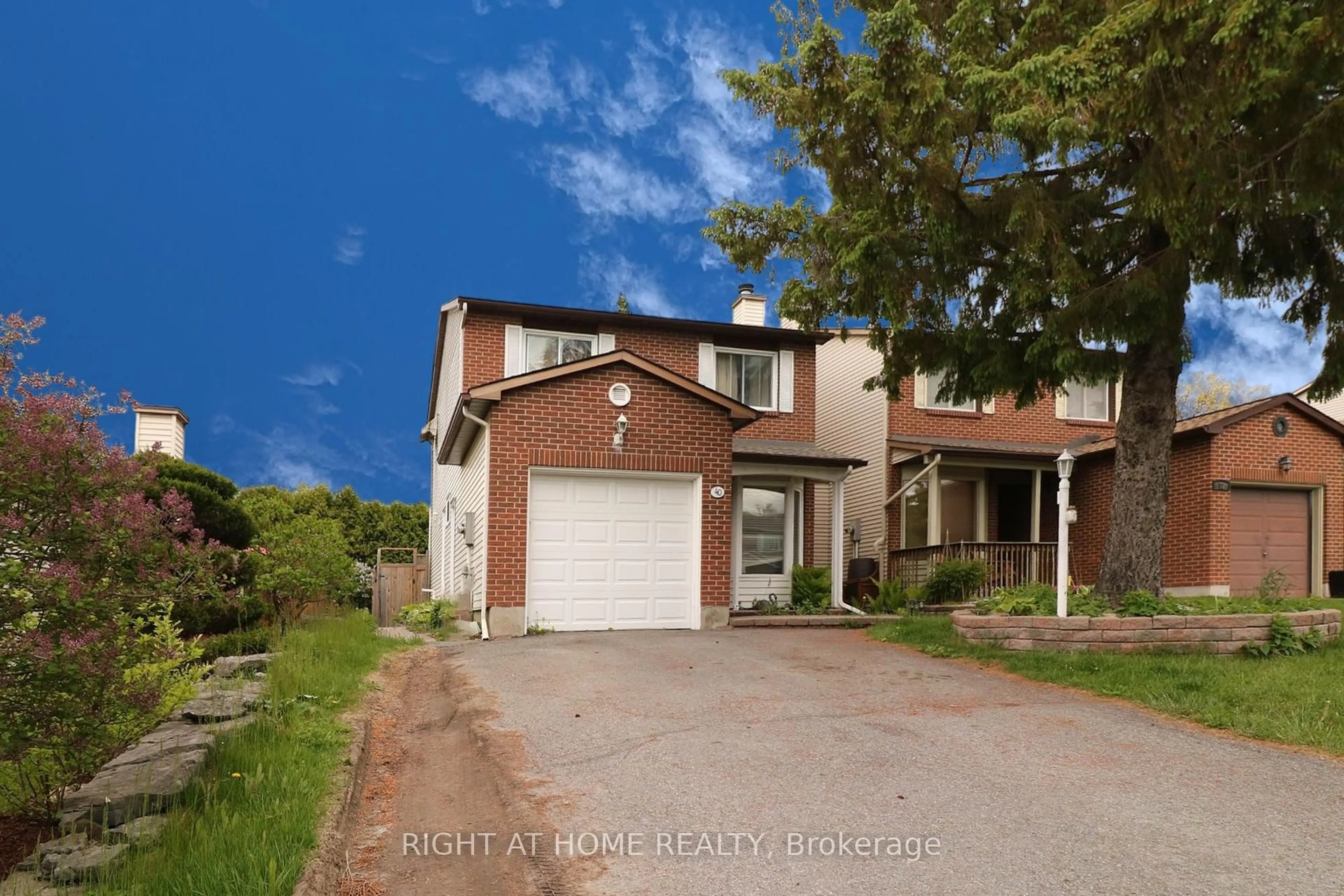 Home with brick exterior material, street for 40 Stable Way, Kanata Ontario K2M 1A6