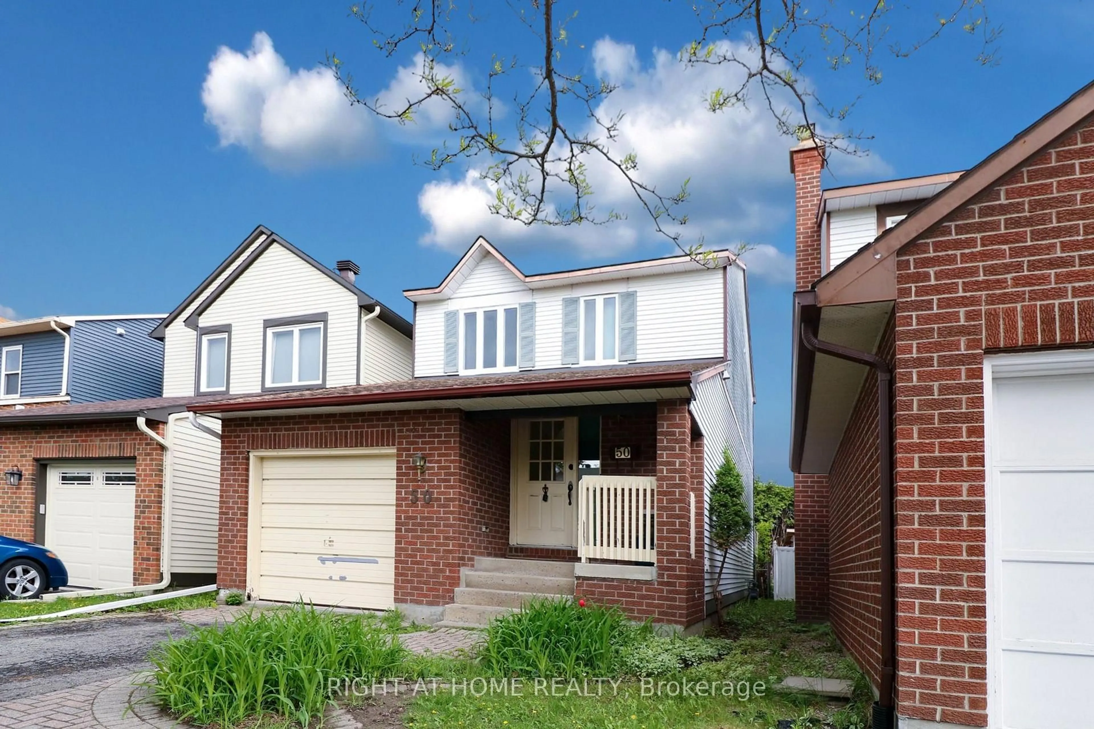 Home with brick exterior material, street for 50 Fireside Cres, Ottawa Ontario K1T 1Z4