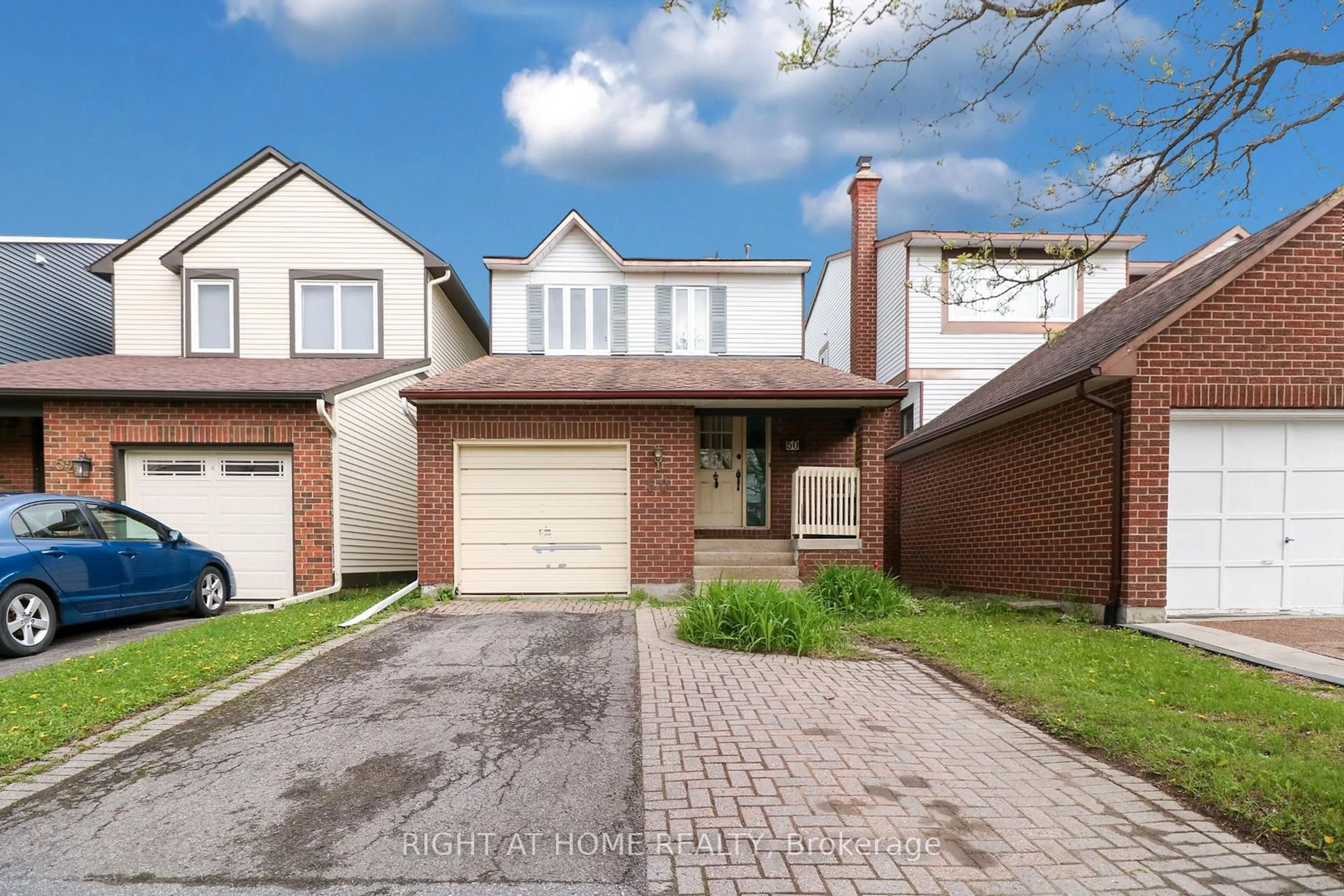 Home with brick exterior material, street for 50 Fireside Cres, Ottawa Ontario K1T 1Z4