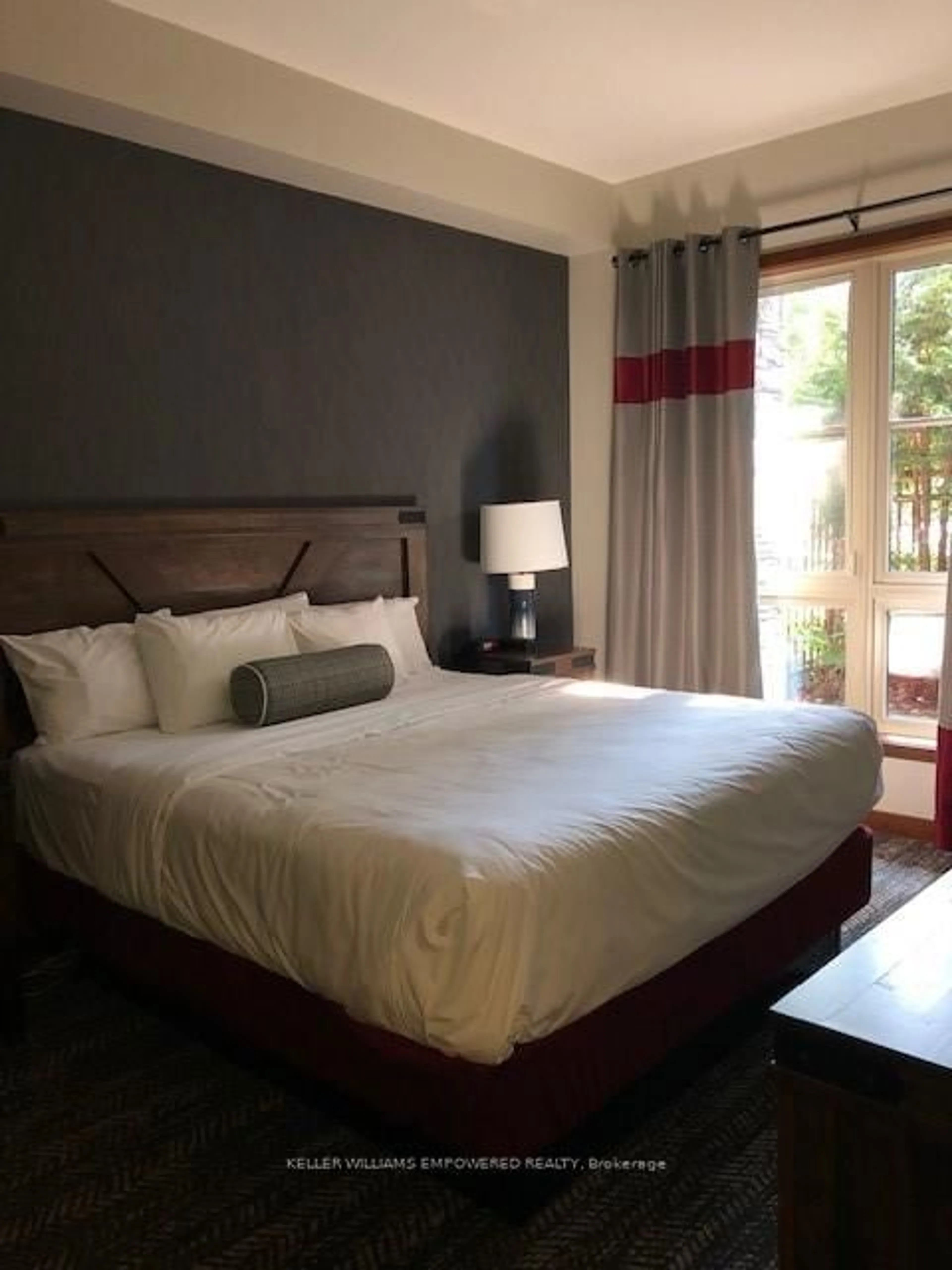 Bedroom with bed, wood/laminate floor for 152 Jozo Weider Blvd #132, Blue Mountains Ontario L9Y 0V2