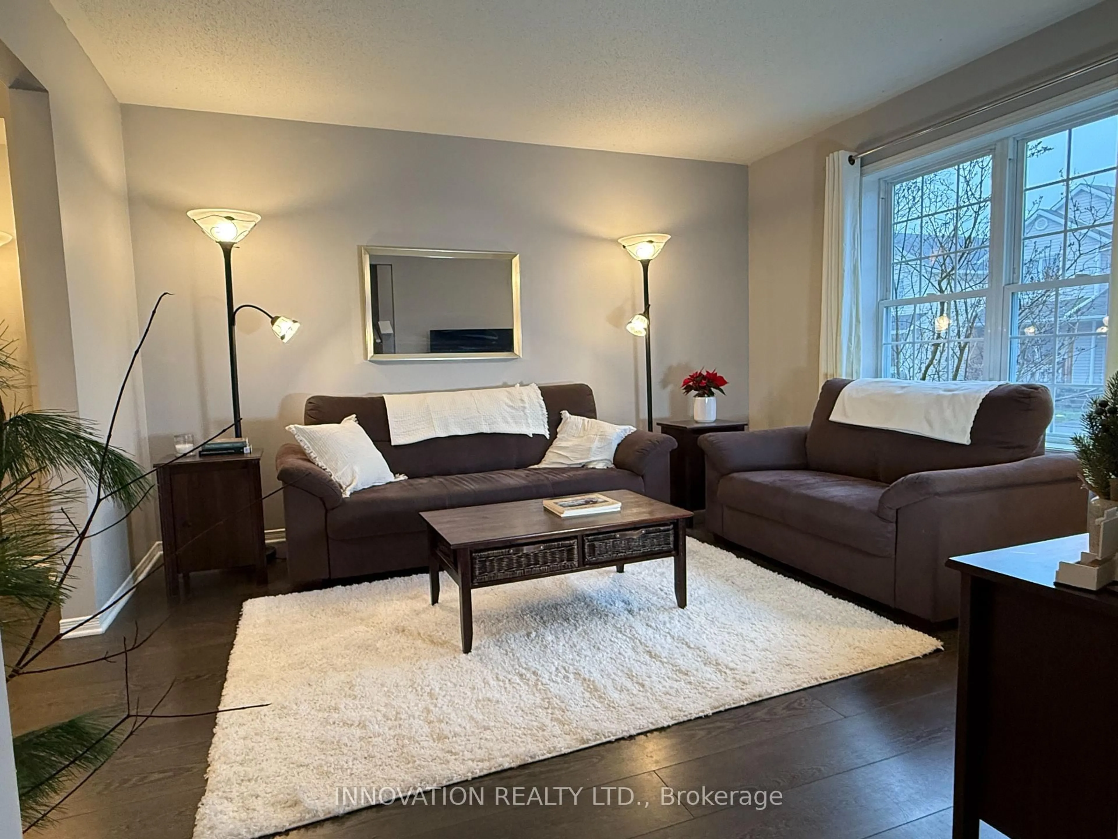 Living room with furniture, wood/laminate floor for 116 Johnston St, Carleton Place Ontario K7C 4R8