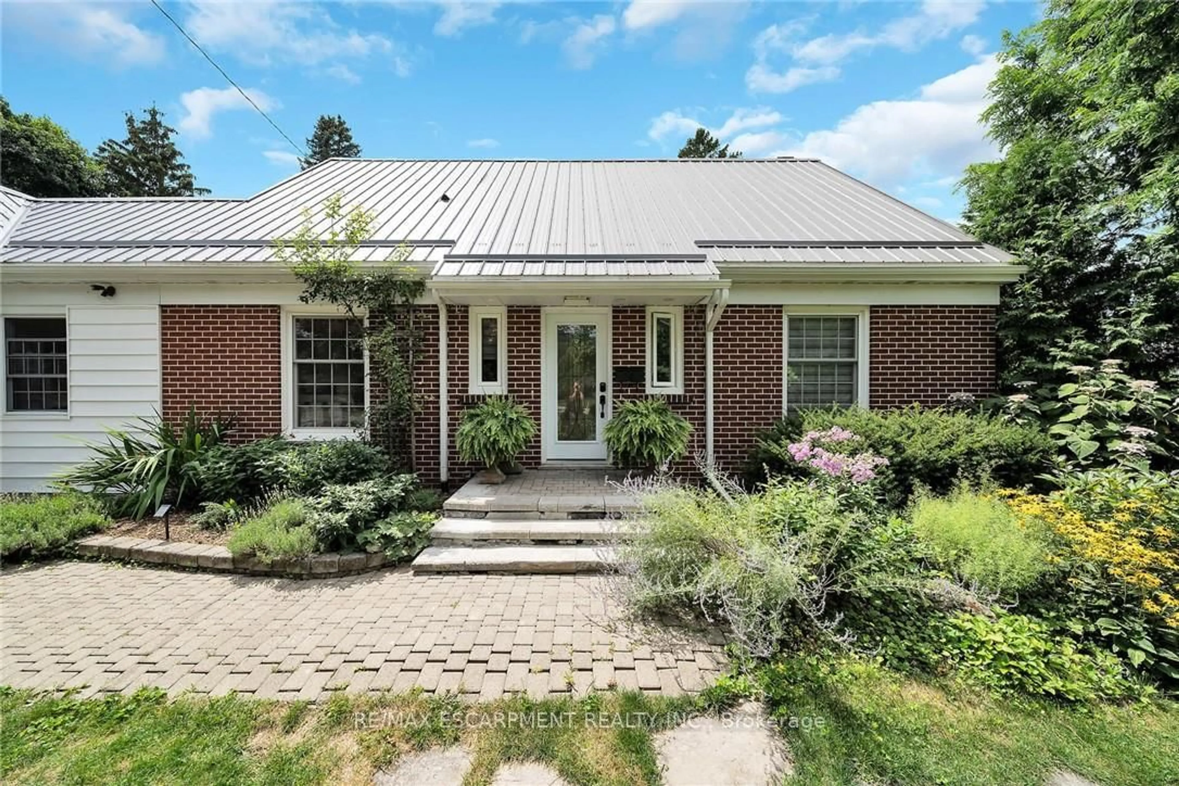 Home with brick exterior material, street for 14 Simcoe Blvd, Norfolk Ontario N3Y 3L5