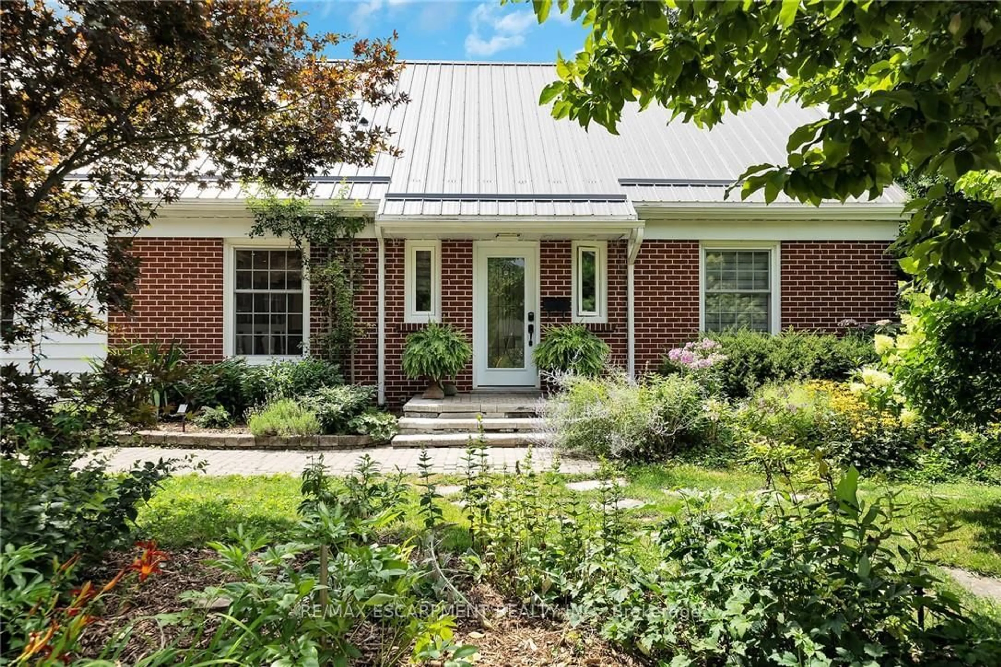 Home with brick exterior material, street for 14 Simcoe Blvd, Norfolk Ontario N3Y 3L5