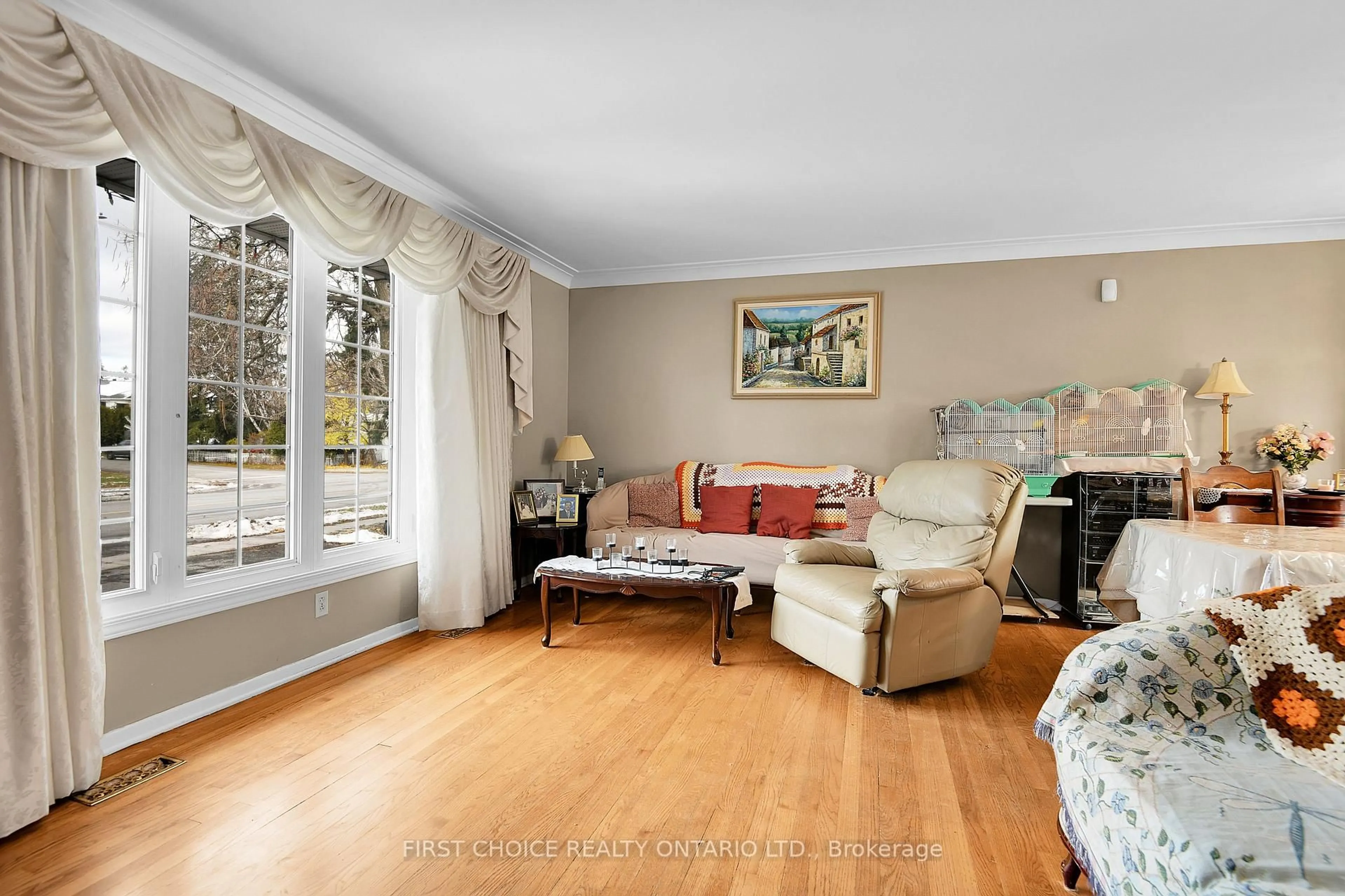 Living room with furniture, unknown for 22 Meadowlands Dr, Ottawa Ontario K2G 2R4