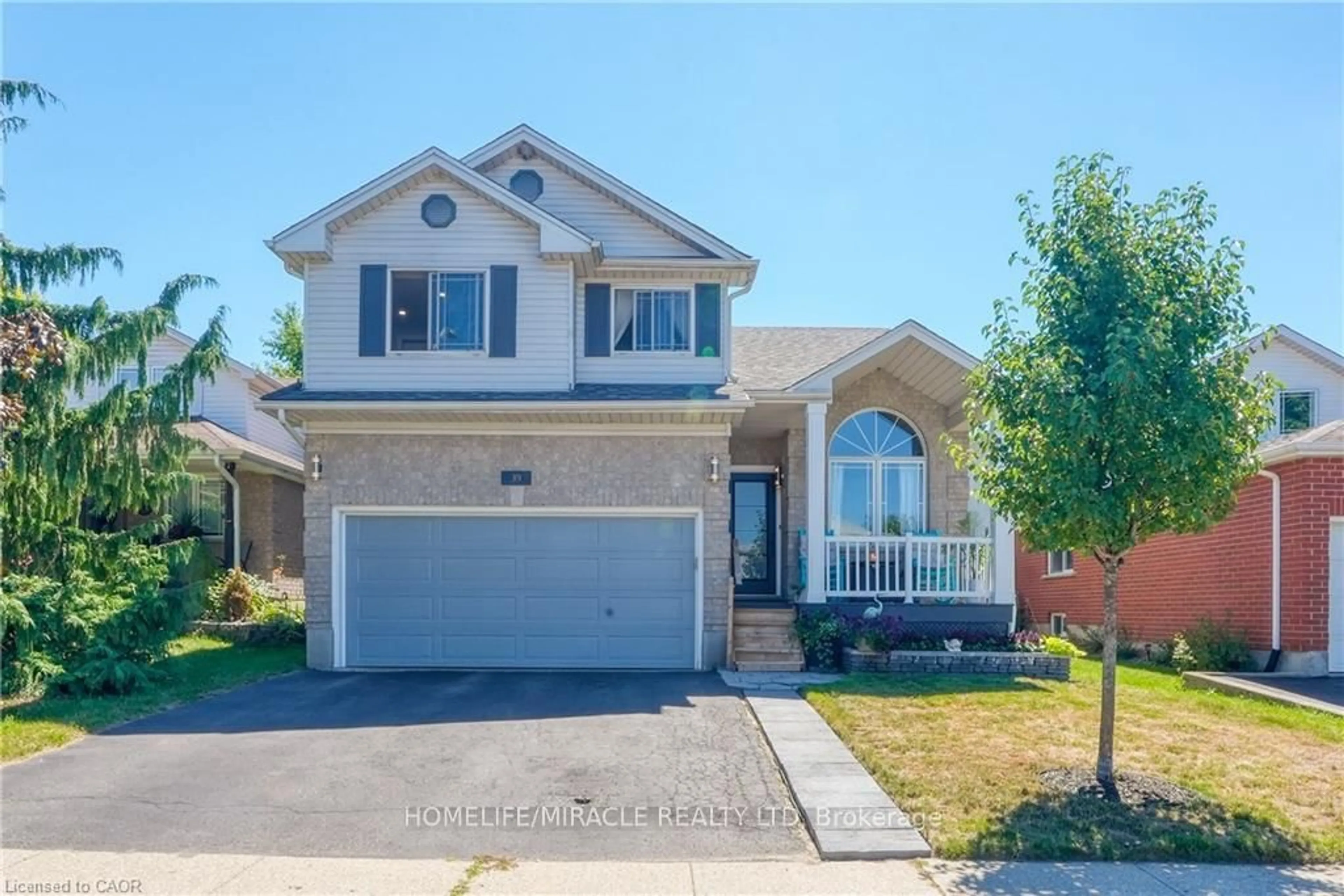 Home with vinyl exterior material, street for 39 Endeavour Dr, Cambridge Ontario N3C 4C4