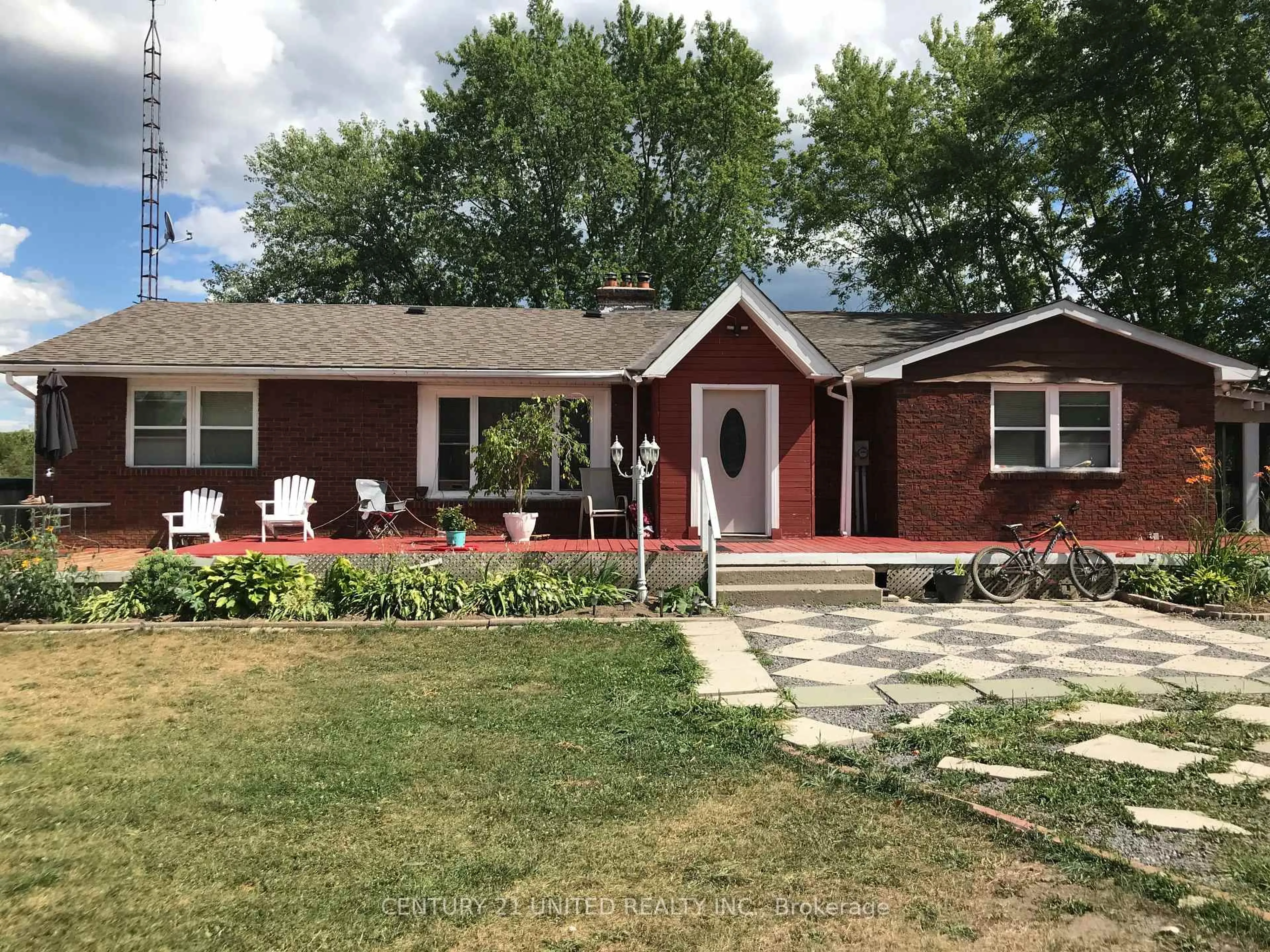 Home with brick exterior material, street for 1677 Douro First Line, Douro-Dummer Ontario K0L 2H0