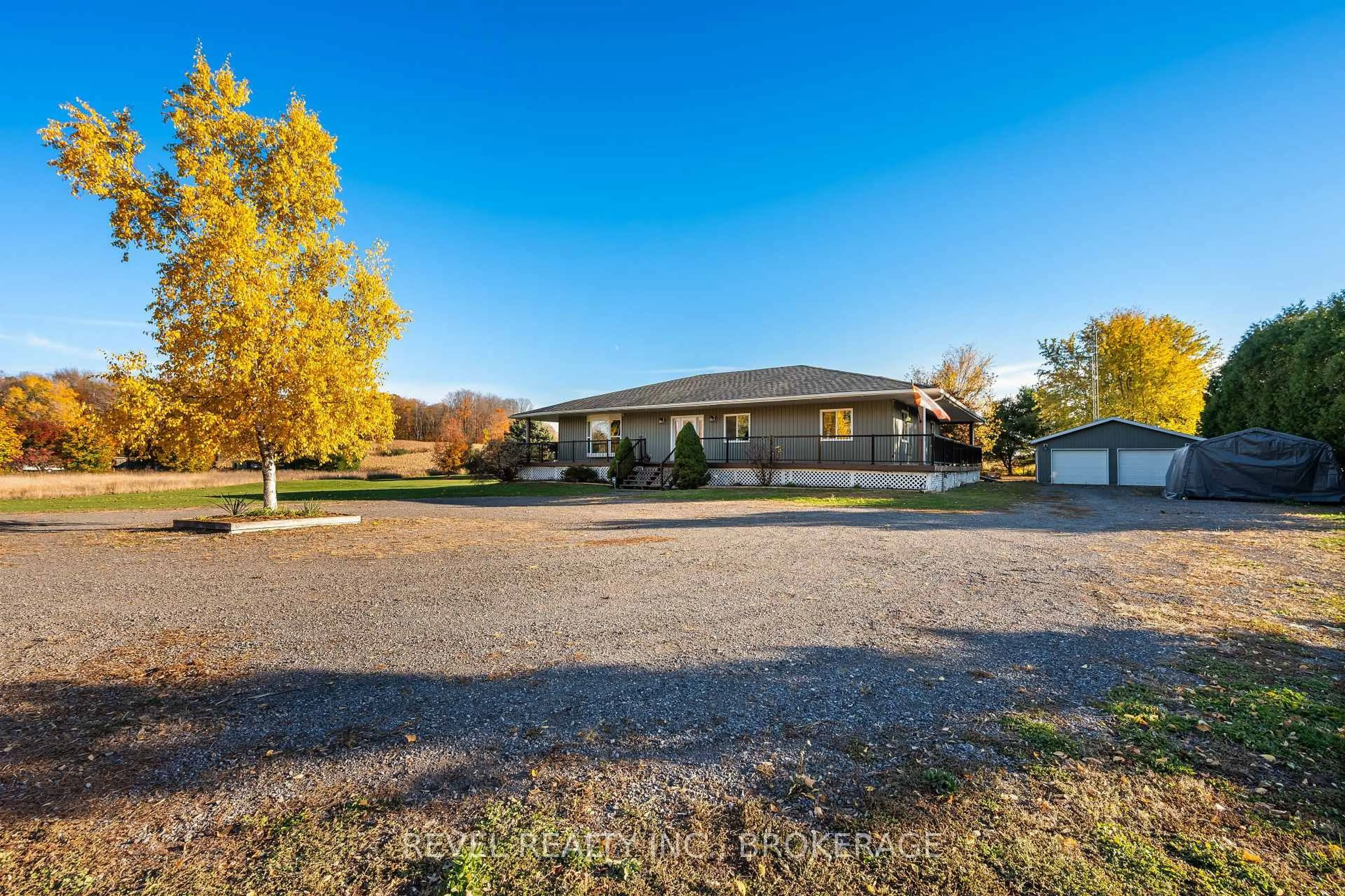A pic from outside/outdoor area/front of a property/back of a property/a pic from drone, street for 2089 Sunbury Rd, Inverary Ontario K0H 1X0