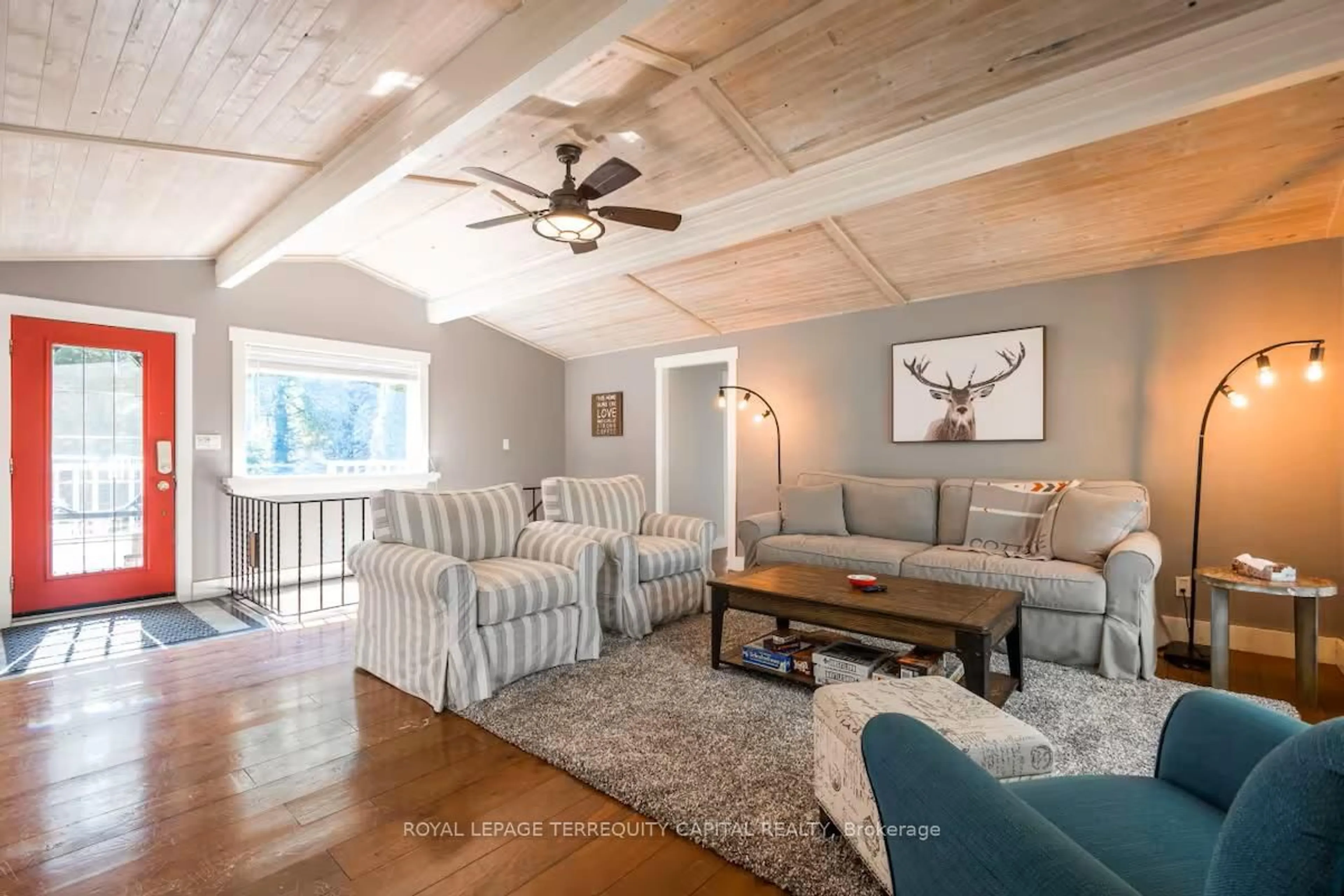 Living room with furniture, wood/laminate floor for 9 Denniss Dr, Bracebridge Ontario P1L 1W9