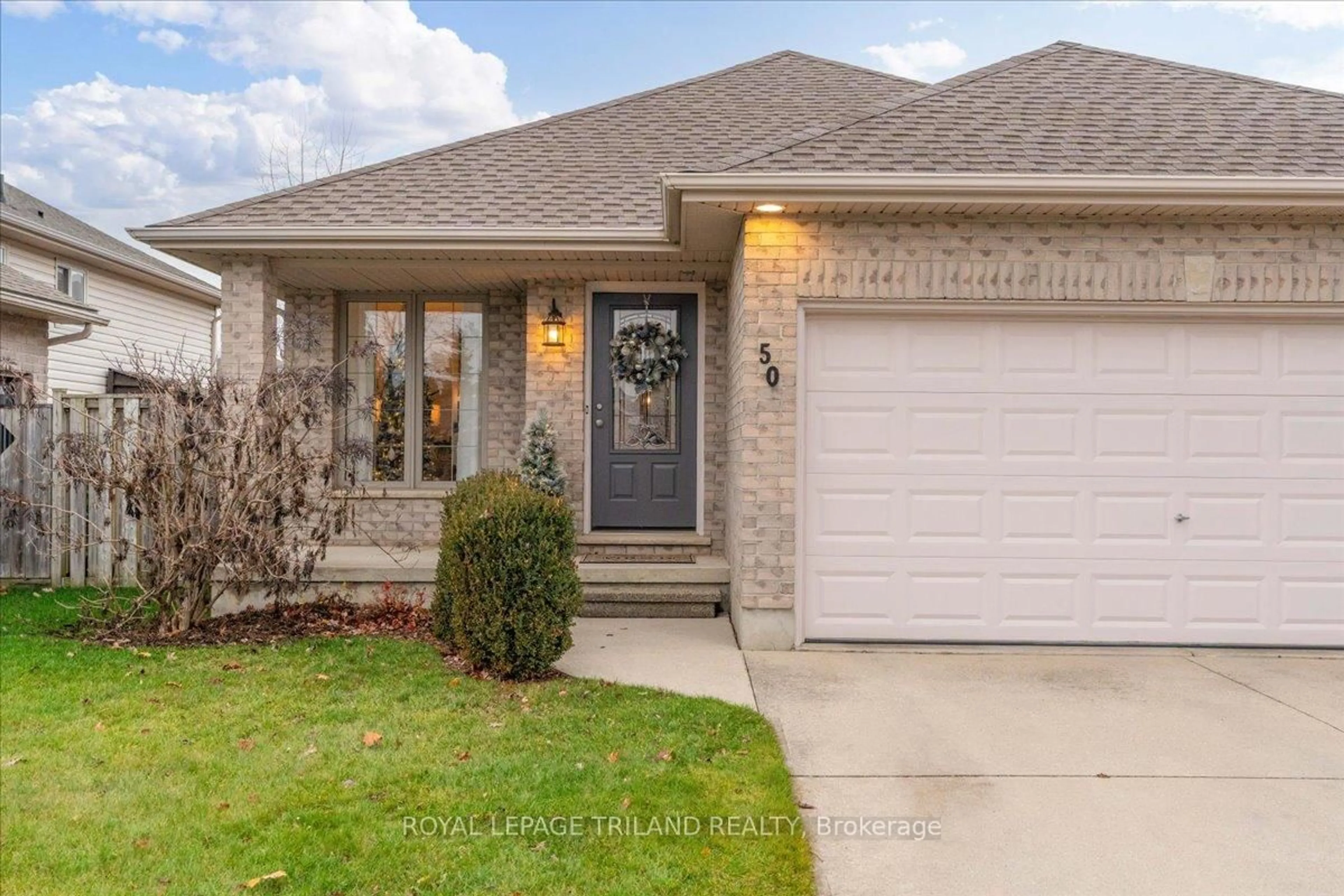 Home with brick exterior material, street for 50 Queensway Dr, Strathroy-Caradoc Ontario N7G 4M3