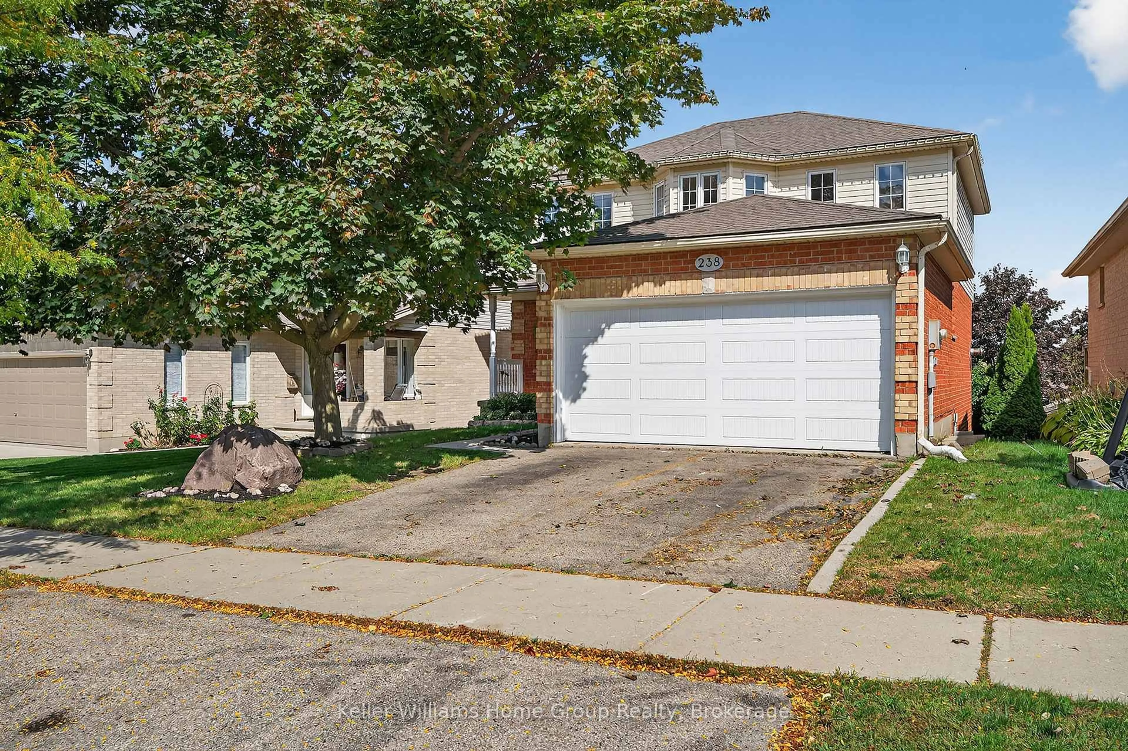 Home with brick exterior material, street for 238 Briarmeadow Dr, Kitchener Ontario N2A 4C4