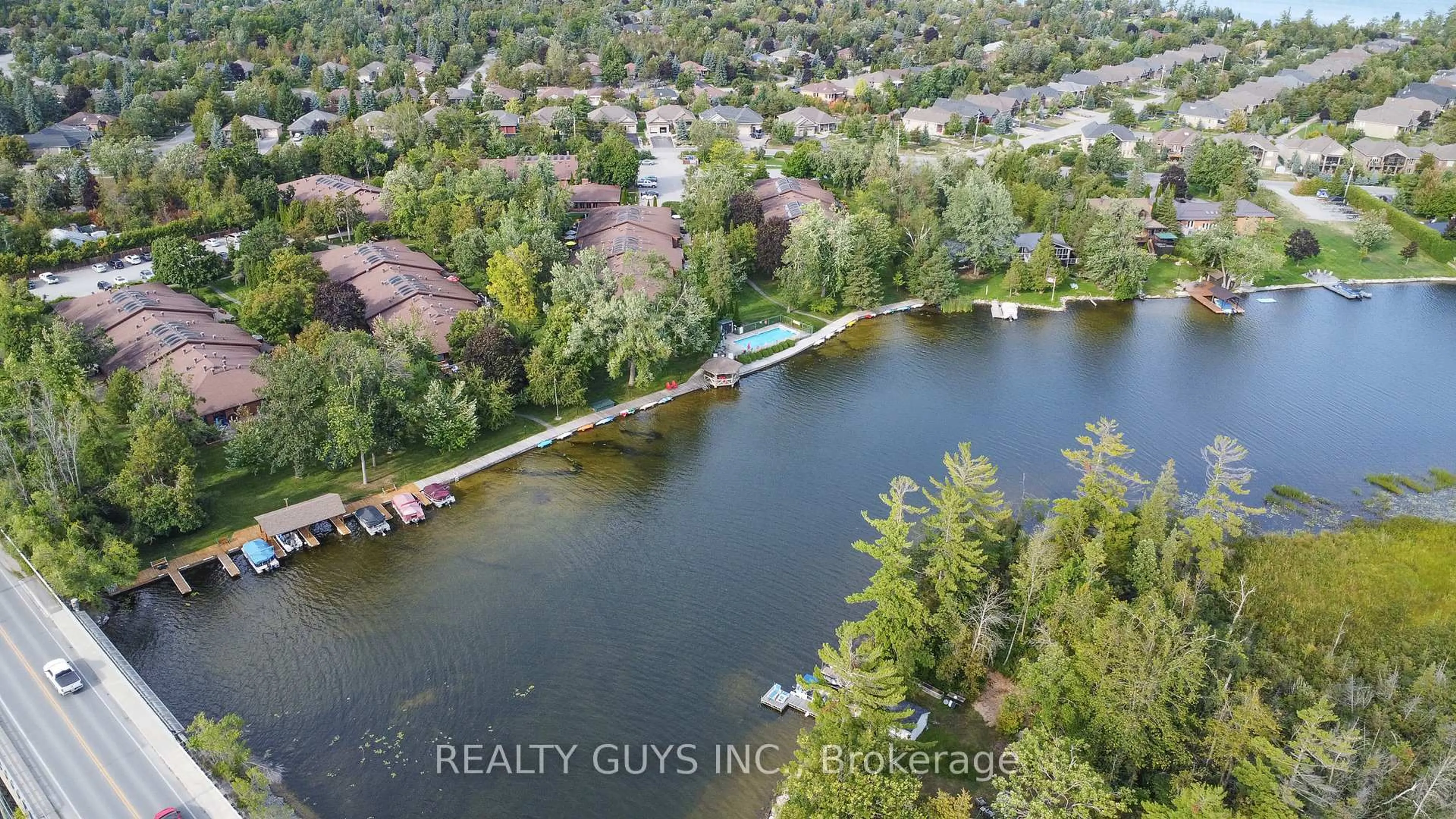 A pic from outside/outdoor area/front of a property/back of a property/a pic from drone, water/lake/river/ocean view for 200 EAST St #unit #204, Kawartha Lakes Ontario K0M 1A0