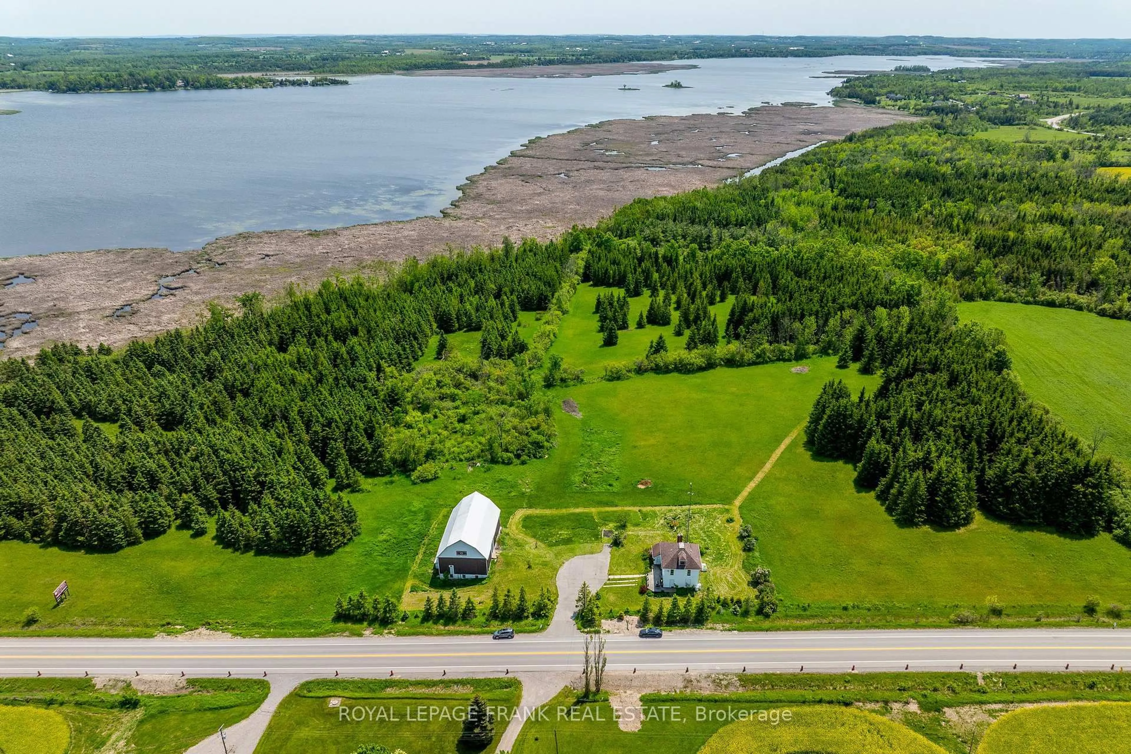 A pic from outside/outdoor area/front of a property/back of a property/a pic from drone, water/lake/river/ocean view for 1916 Pigeon Lake Rd, Kawartha Lakes Ontario K9V 4R5
