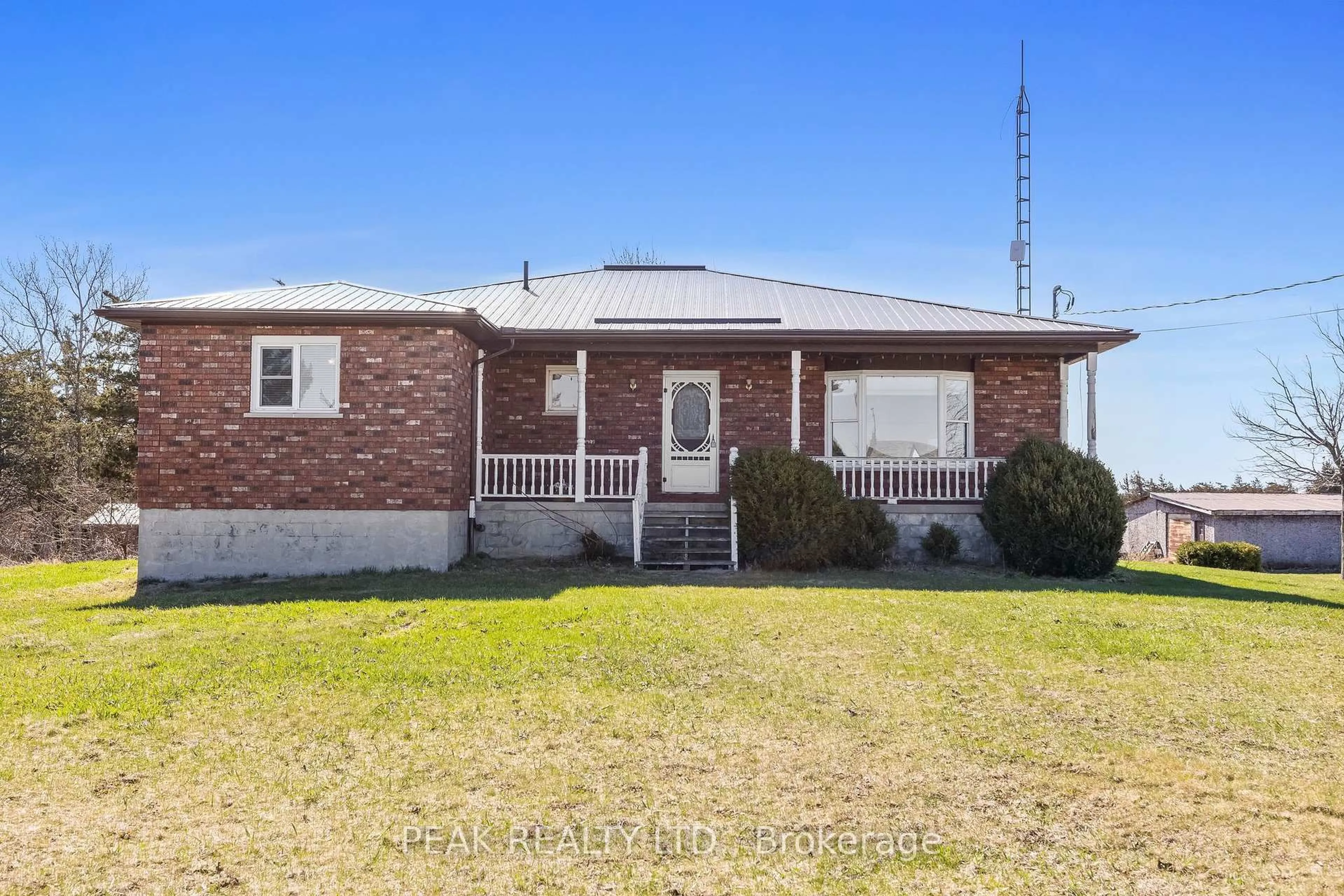 Home with brick exterior material, street for 1958 County Rd 7 Rd, Prince Edward County Ontario K0K 2T0