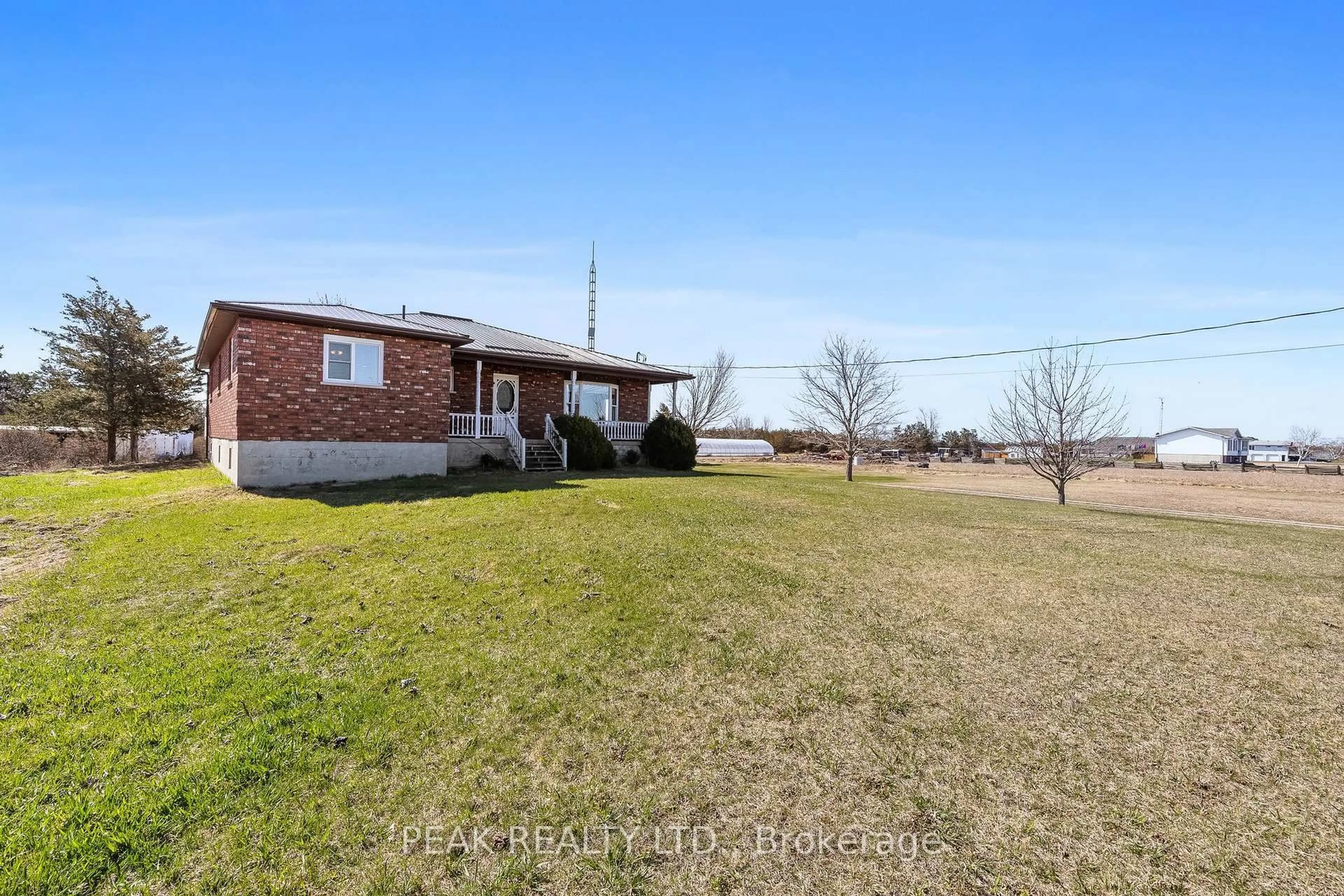 A pic from outside/outdoor area/front of a property/back of a property/a pic from drone, unknown for 1958 County Rd 7 Rd, Prince Edward County Ontario K0K 2T0