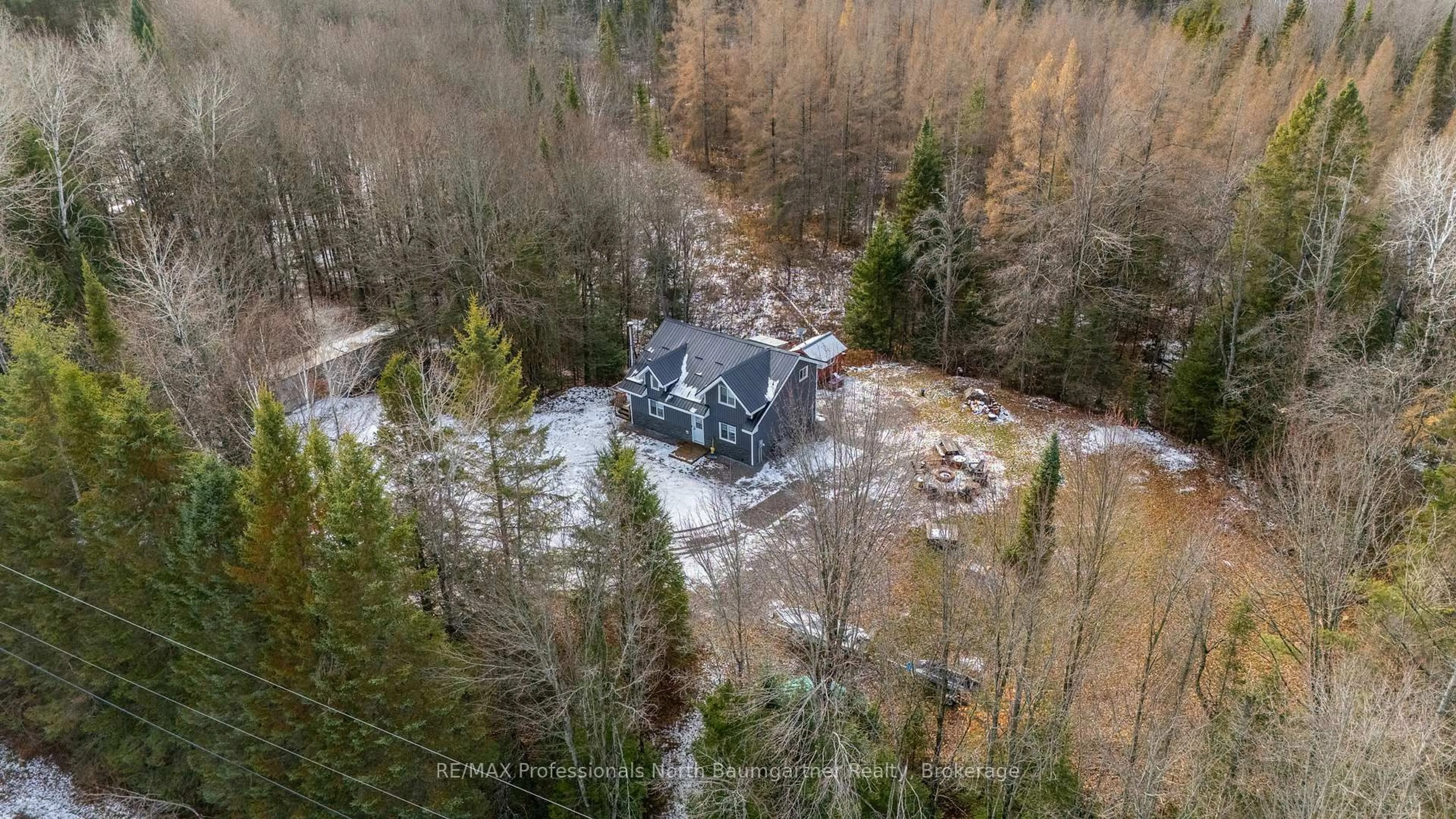 A pic from outside/outdoor area/front of a property/back of a property/a pic from drone, water/lake/river/ocean view for 3475 Gelert Rd, Minden Hills Ontario K0M 2K0