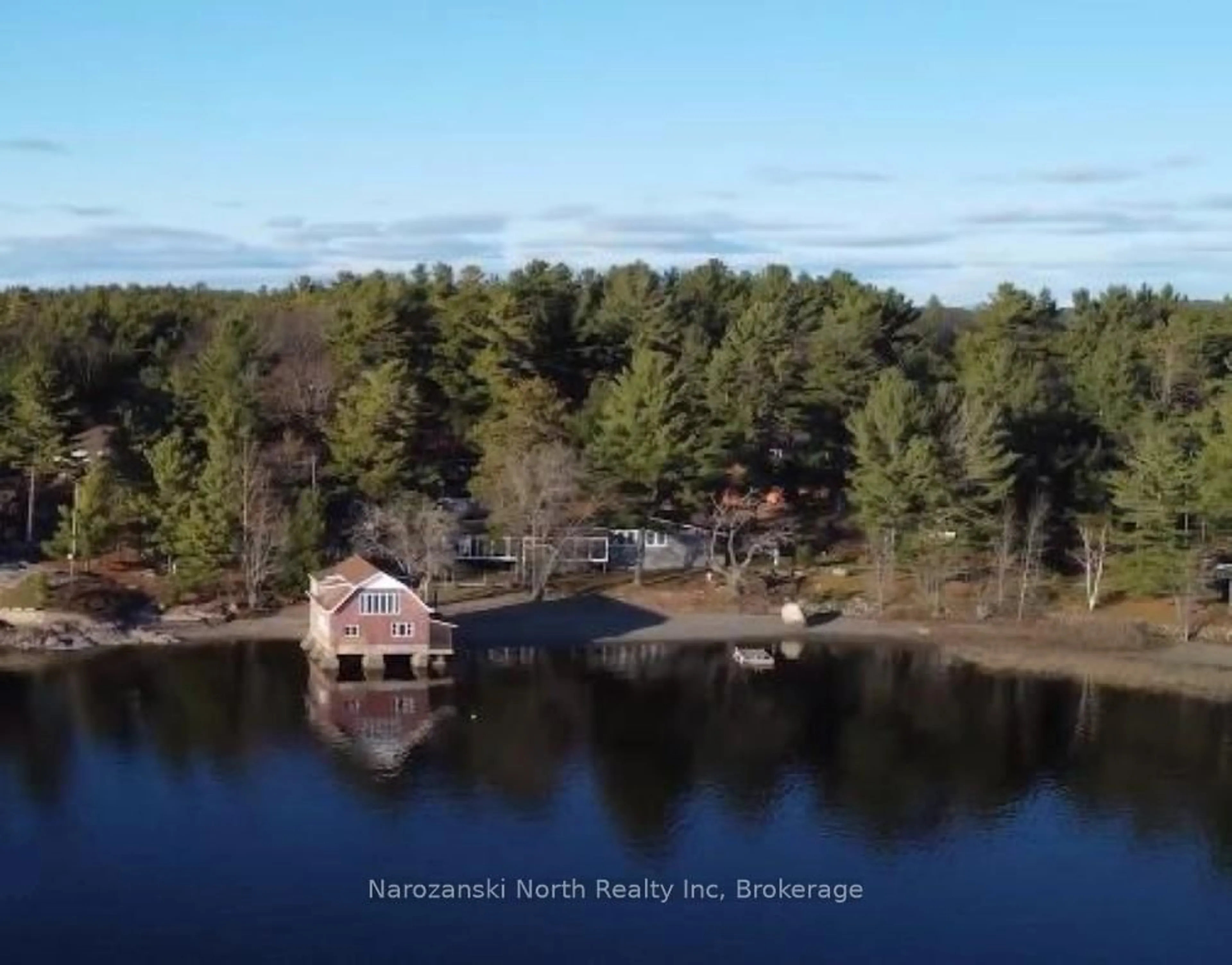 A pic from outside/outdoor area/front of a property/back of a property/a pic from drone, water/lake/river/ocean view for 25 Pine Ridge Rd, French River Ontario P0M 1A0
