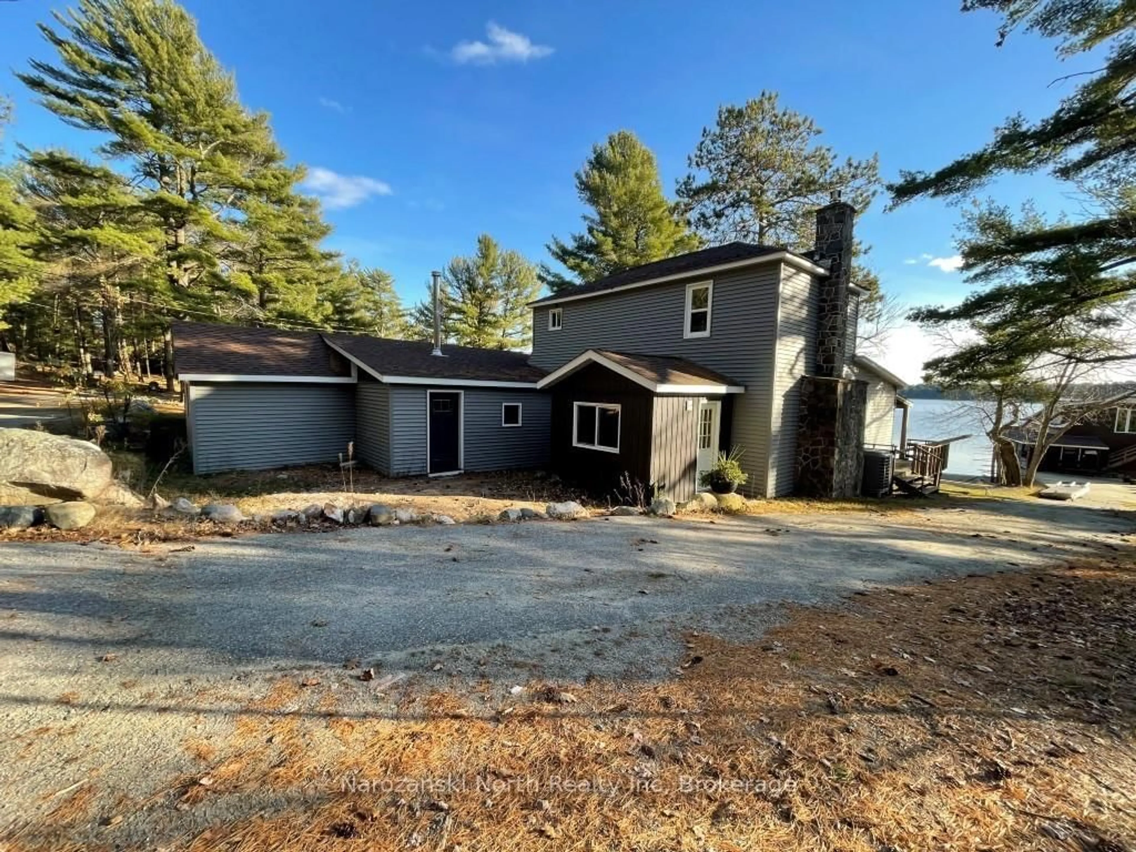 A pic from outside/outdoor area/front of a property/back of a property/a pic from drone, unknown for 25 Pine Ridge Rd, French River Ontario P0M 1A0