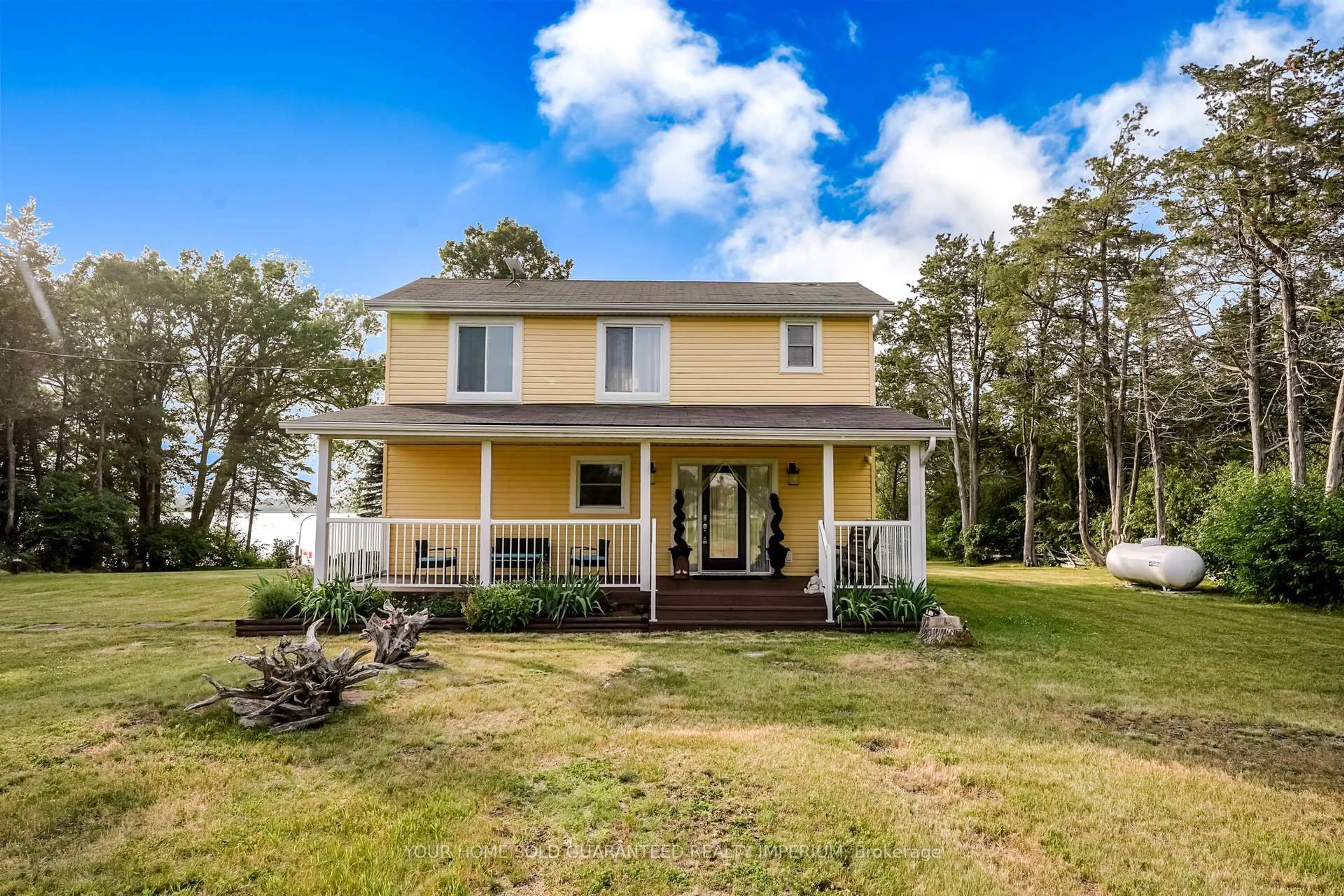 Home with vinyl exterior material, water/lake/river/ocean view for 2491 COUNTY ROAD 15 Rd, Prince Edward County Ontario K0K 2T0