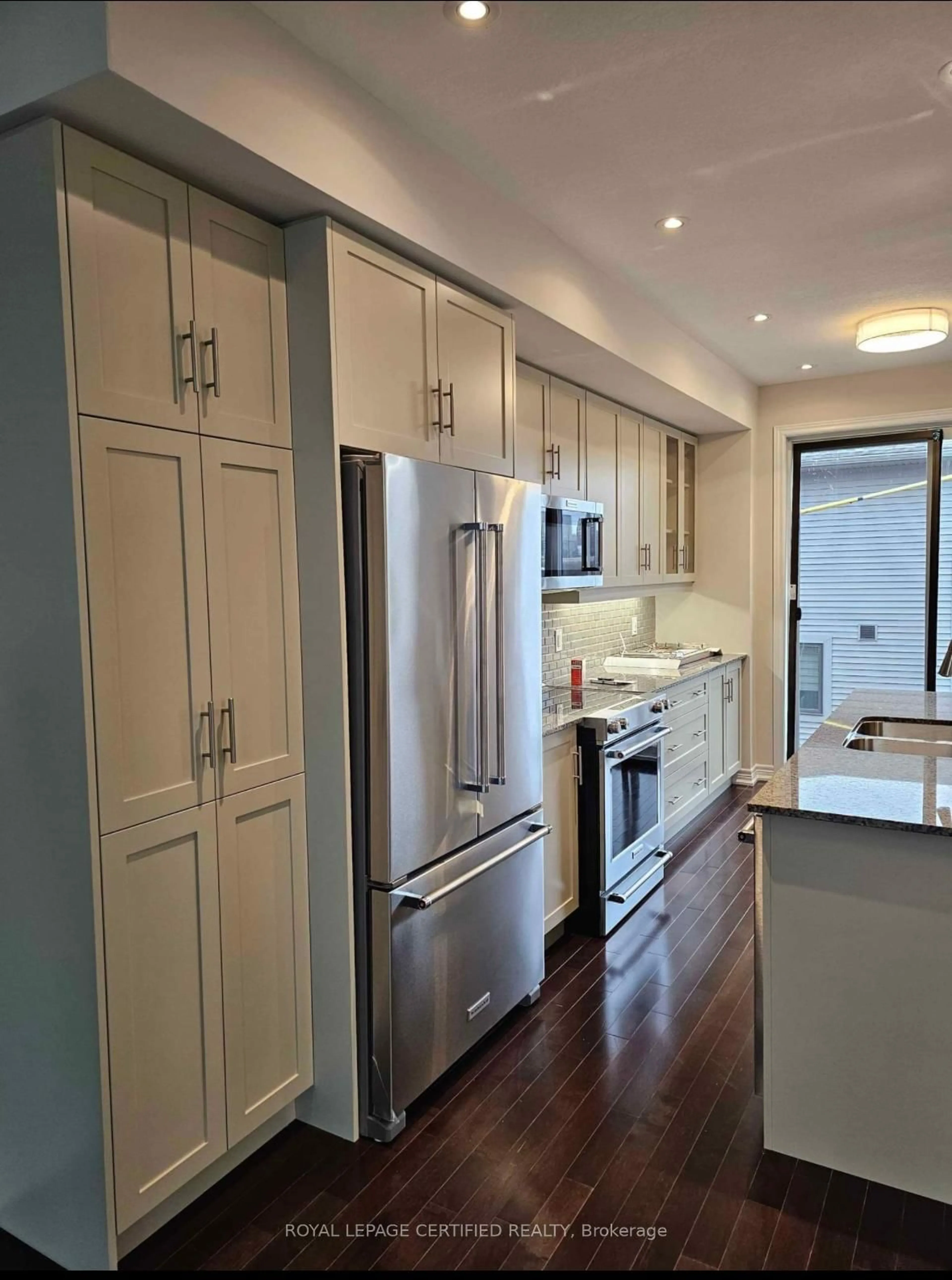 Open concept kitchen, wood/laminate floor for 10 Birmingham Dr. 149 Dr, Cambridge Ontario N1R 0C6