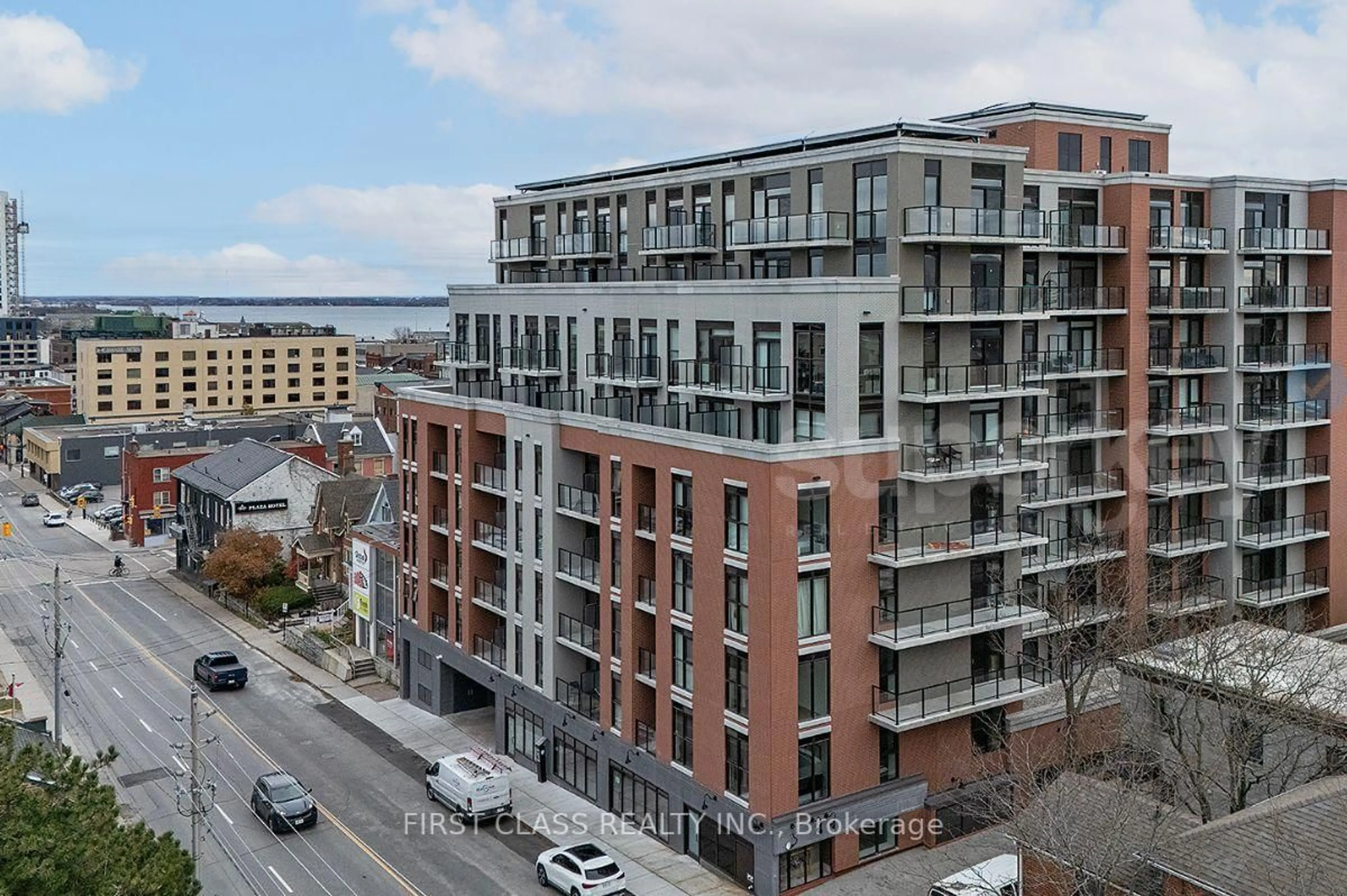A pic from outside/outdoor area/front of a property/back of a property/a pic from drone, city buildings view from balcony for 223 Princess St #403, Kingston Ontario K7L 1B3