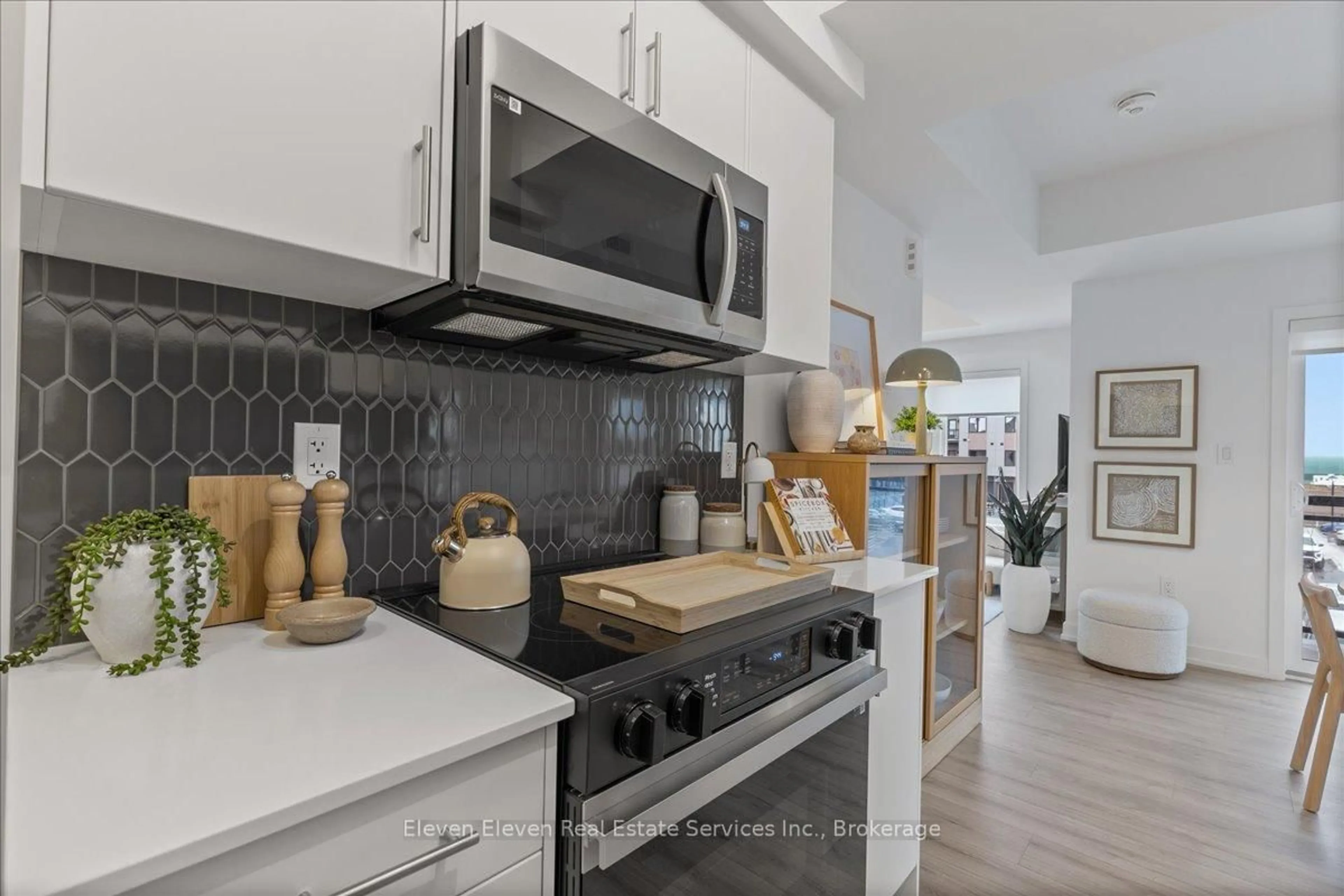 Open concept kitchen, ceramic/tile floor for 940 St. Davids St #91, Centre Wellington Ontario N1M 0L7