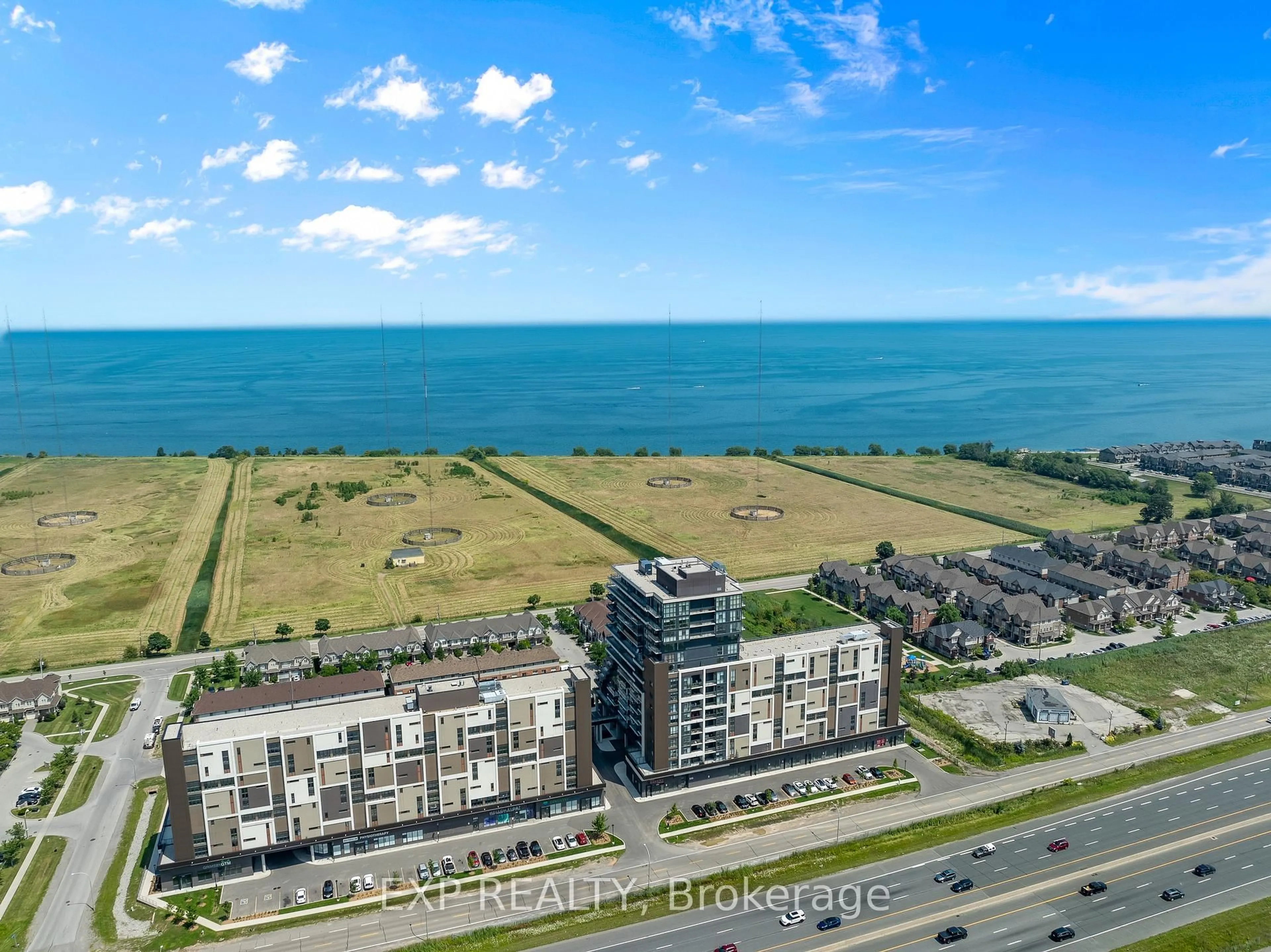 A pic from outside/outdoor area/front of a property/back of a property/a pic from drone, water/lake/river/ocean view for 550 North Service Rd #219, Grimsby Ontario L3M 0H9