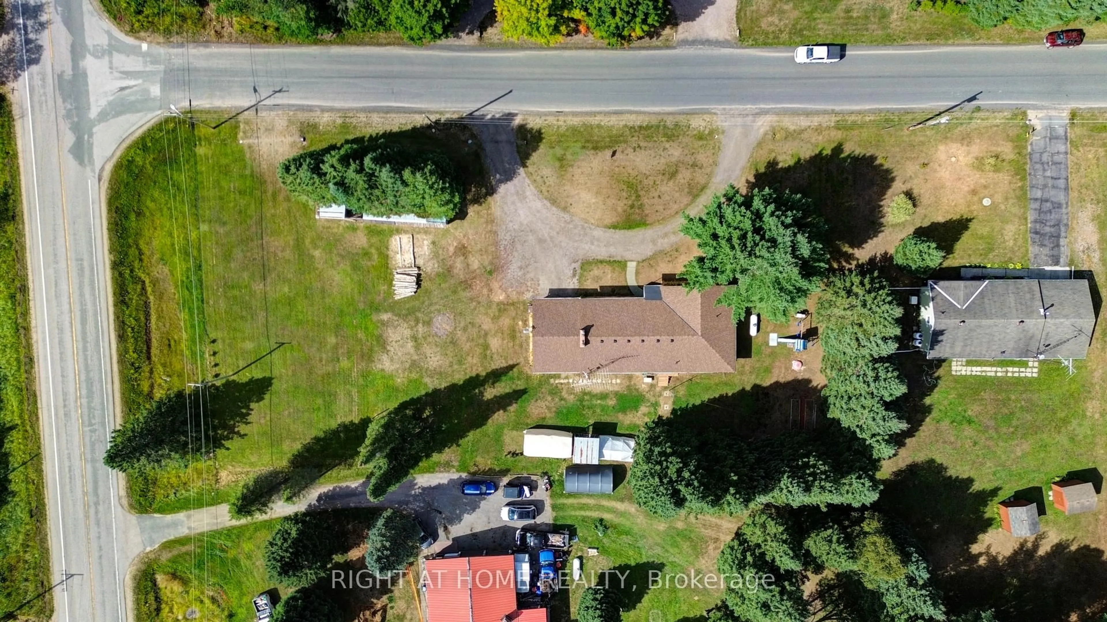 A pic from outside/outdoor area/front of a property/back of a property/a pic from drone, street for 1012 Clement Lake Rd, Highlands East Ontario K0L 3C0