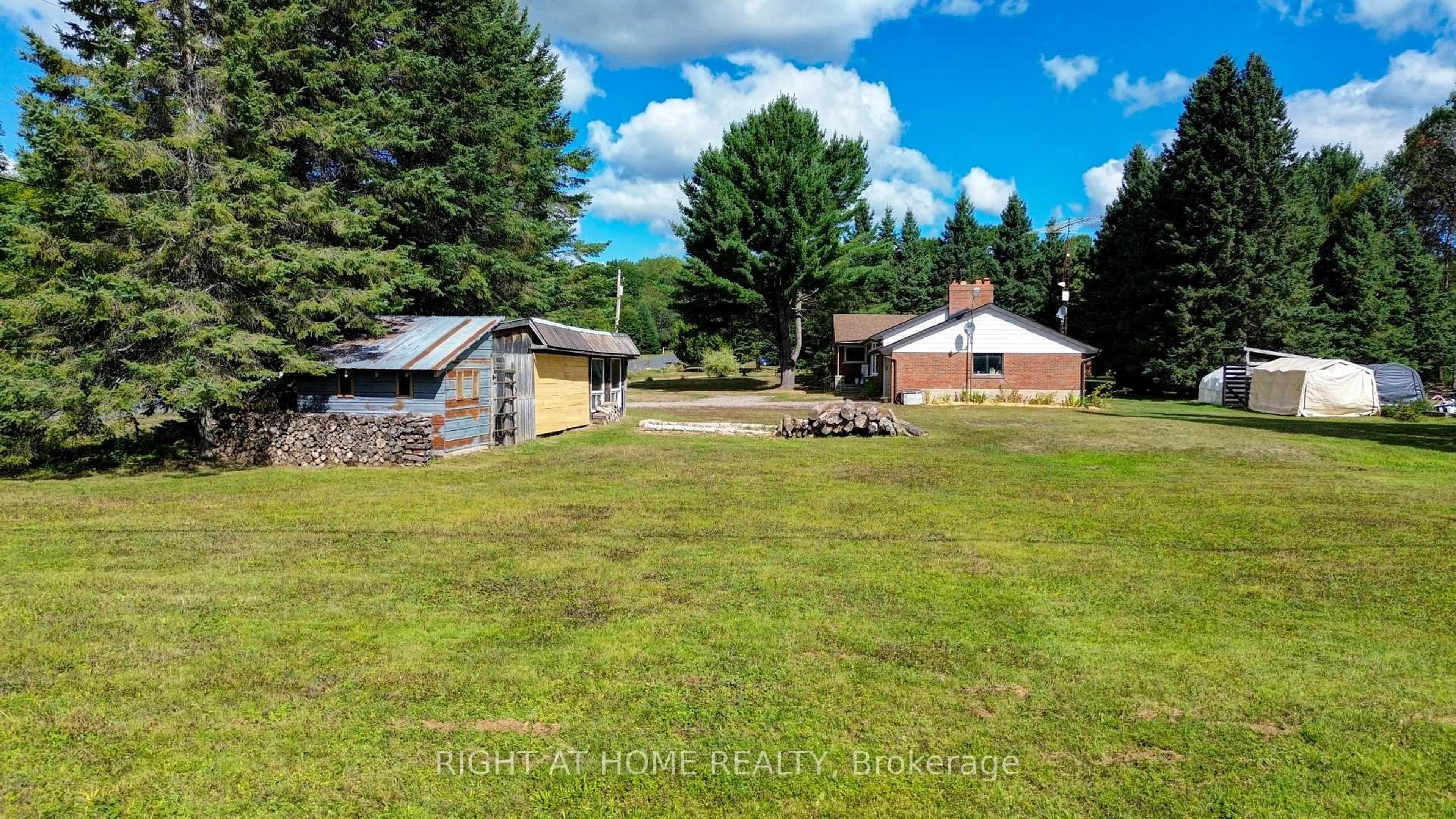A pic from outside/outdoor area/front of a property/back of a property/a pic from drone, unknown for 1012 Clement Lake Rd, Highlands East Ontario K0L 3C0