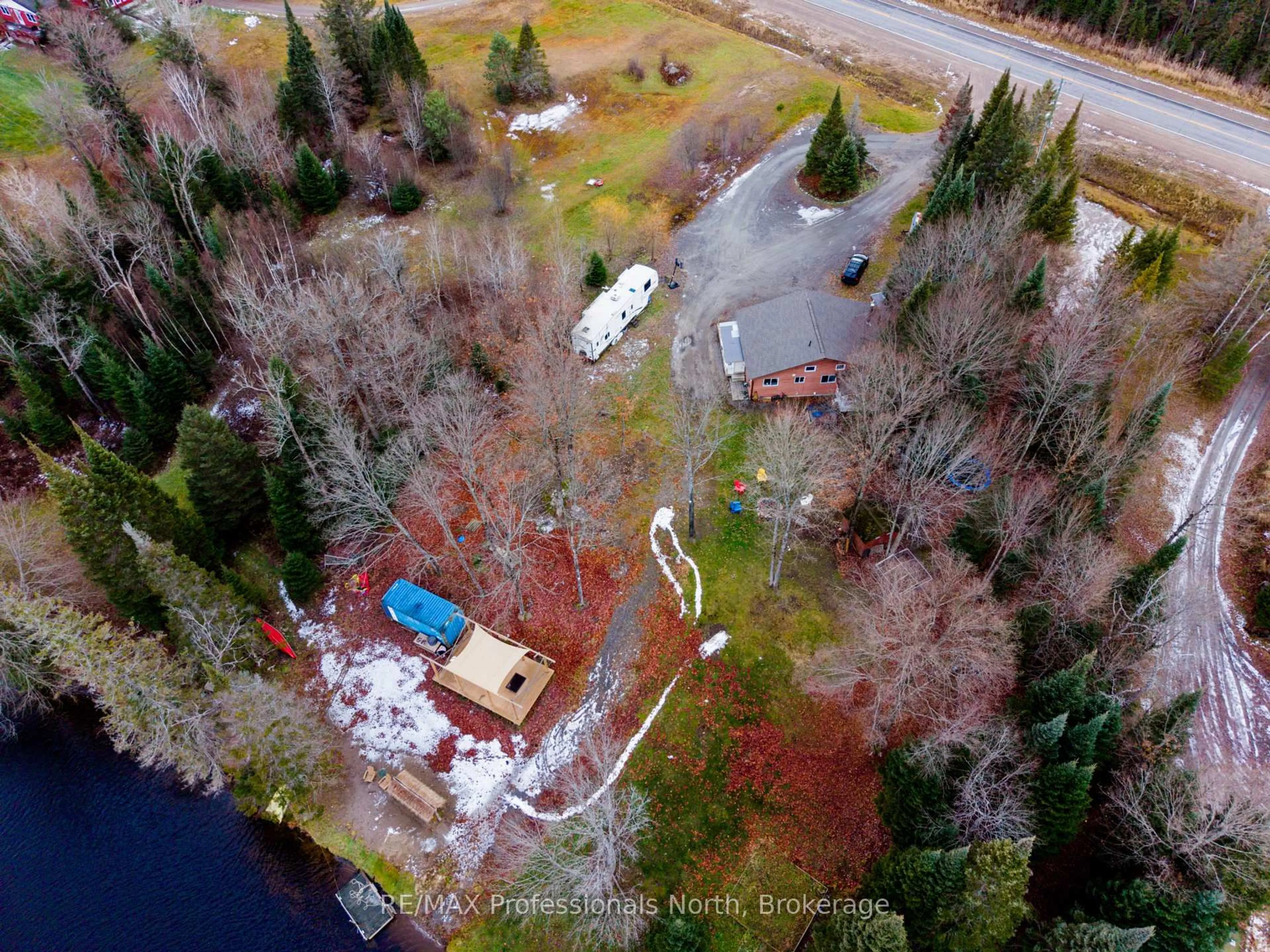 A pic from outside/outdoor area/front of a property/back of a property/a pic from drone, water/lake/river/ocean view for 899 KATRINE Rd, Burk's Falls Ontario P0A 1C0