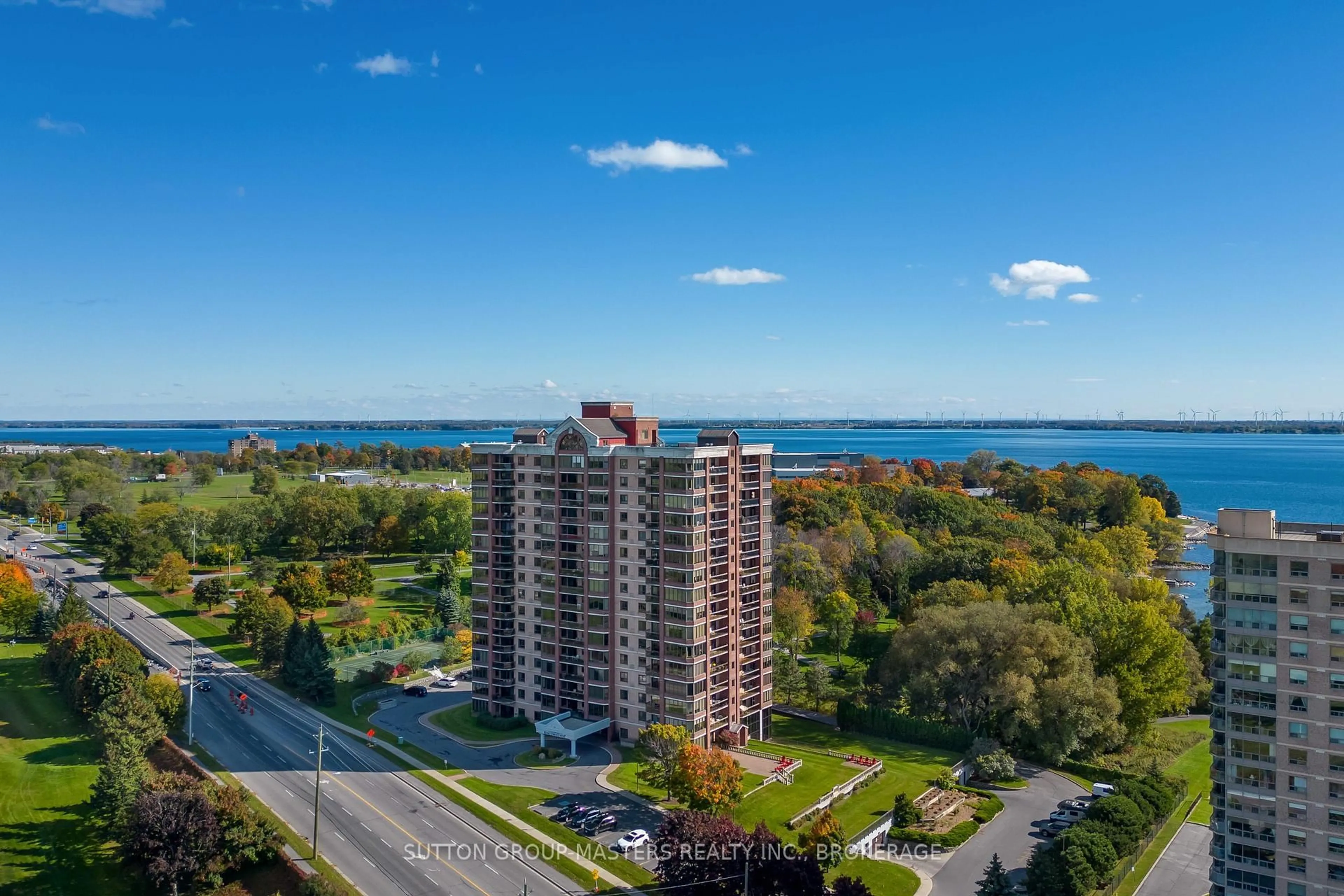 A pic from outside/outdoor area/front of a property/back of a property/a pic from drone, water/lake/river/ocean view for 1000 King St #406, Kingston Ontario K7M 8H3